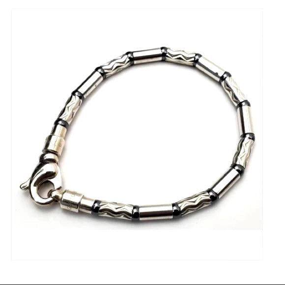 TIFFANY & CO. HEMATITE & AZTEC CARVED STERLING SILVER BRACELET