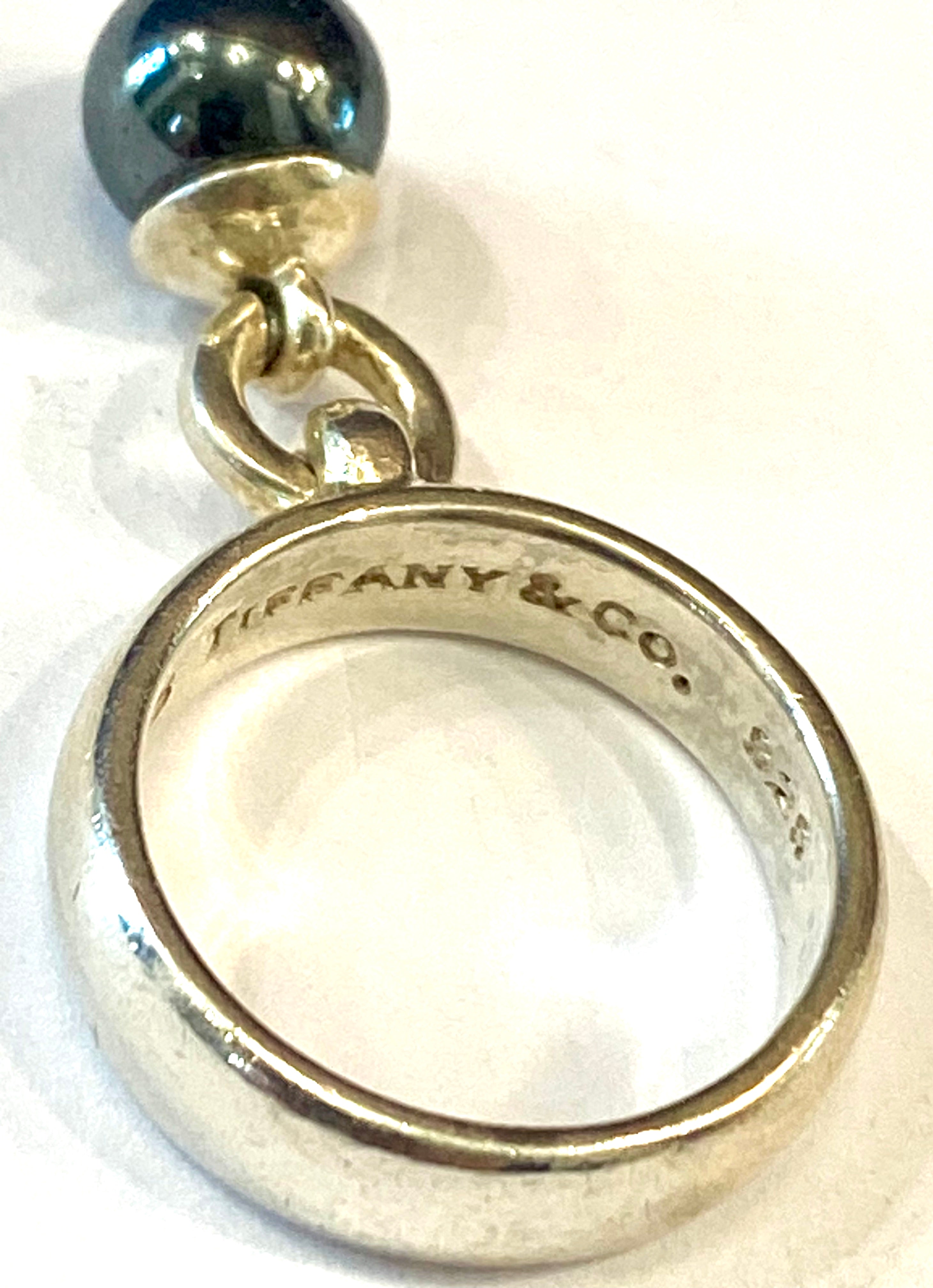 TIFFANY & CO. VINTAGE STERLING SILVER ONYX CHARM RING