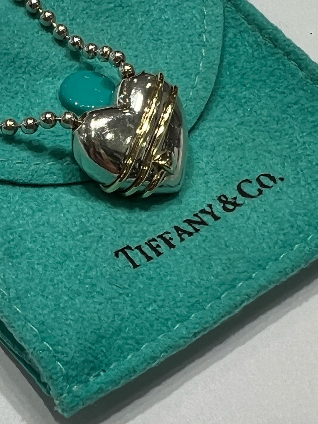 TIFFANY & CO. STERLING 18K GOLD HEART PENDANT