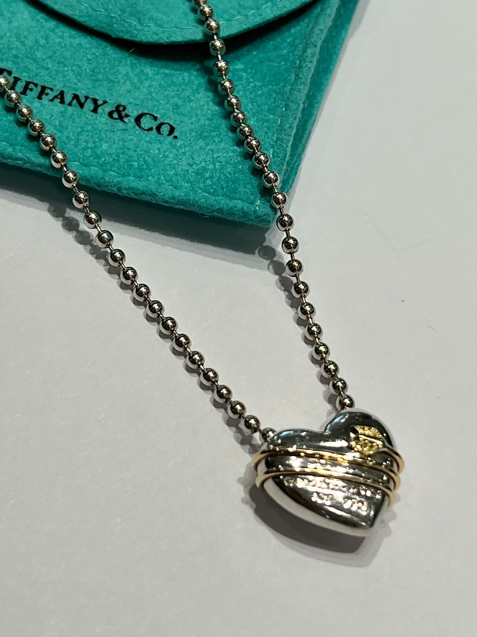 TIFFANY & CO. STERLING 18K GOLD HEART PENDANT
