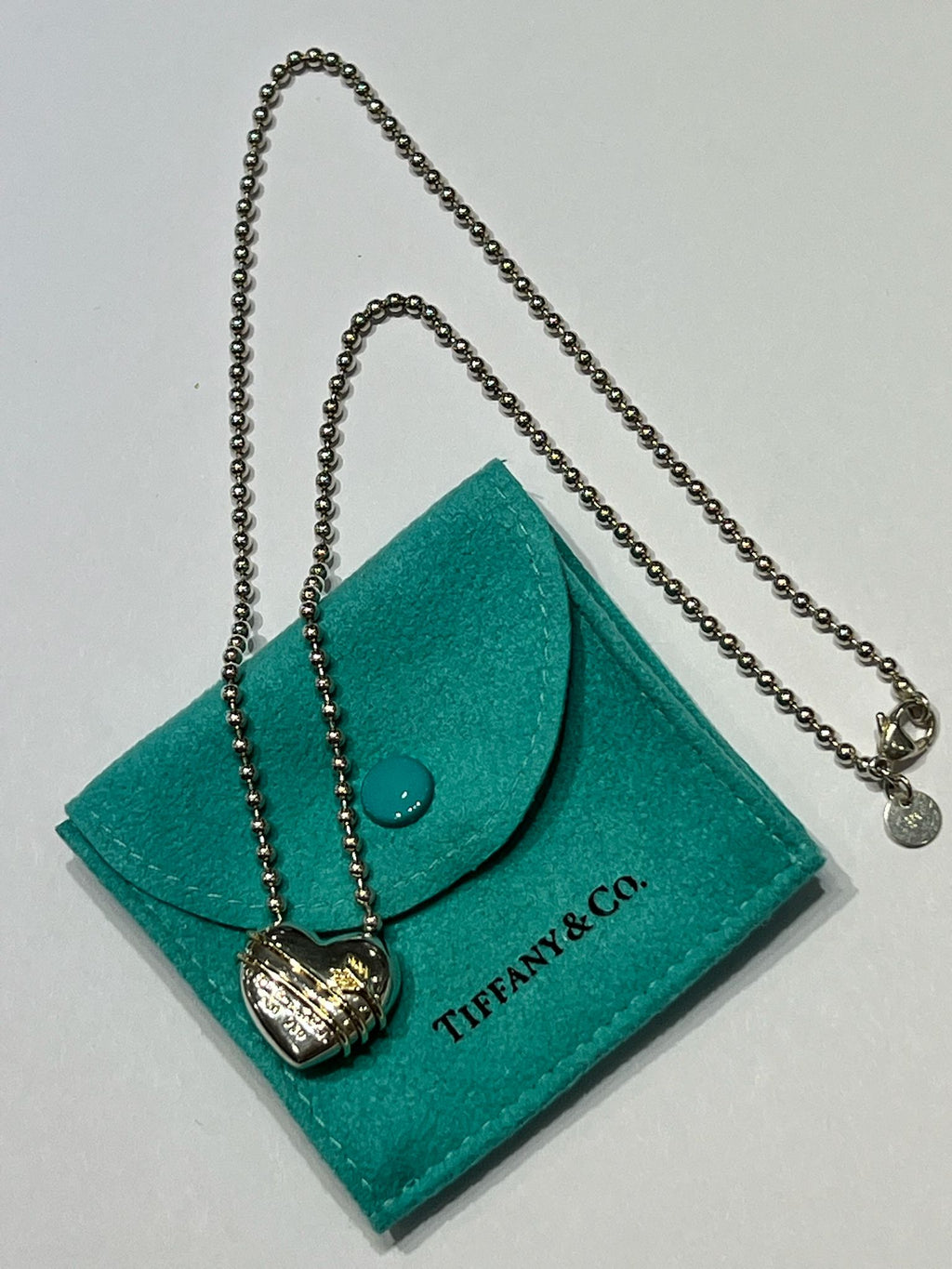 TIFFANY & CO. STERLING 18K GOLD HEART PENDANT