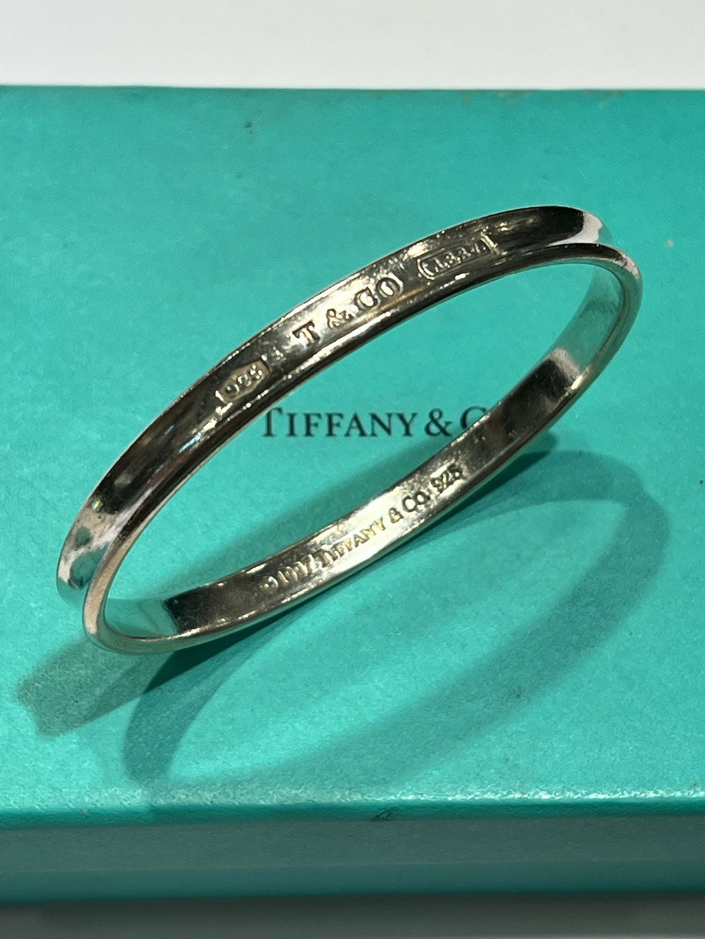 TIFFANY & CO. STERLING SILVER BANGLE