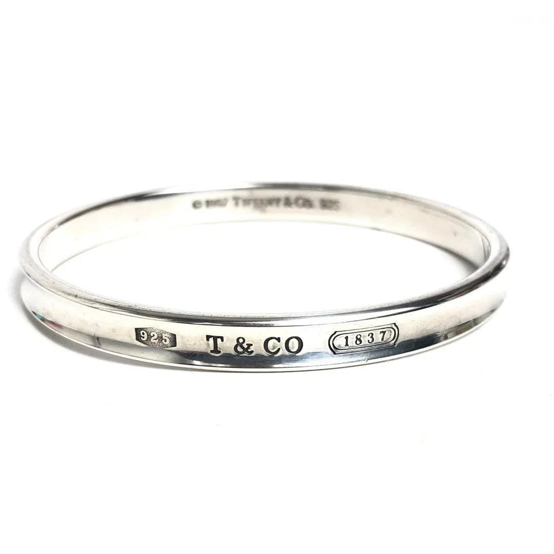 TIFFANY & CO. STERLING SILVER BANGLE