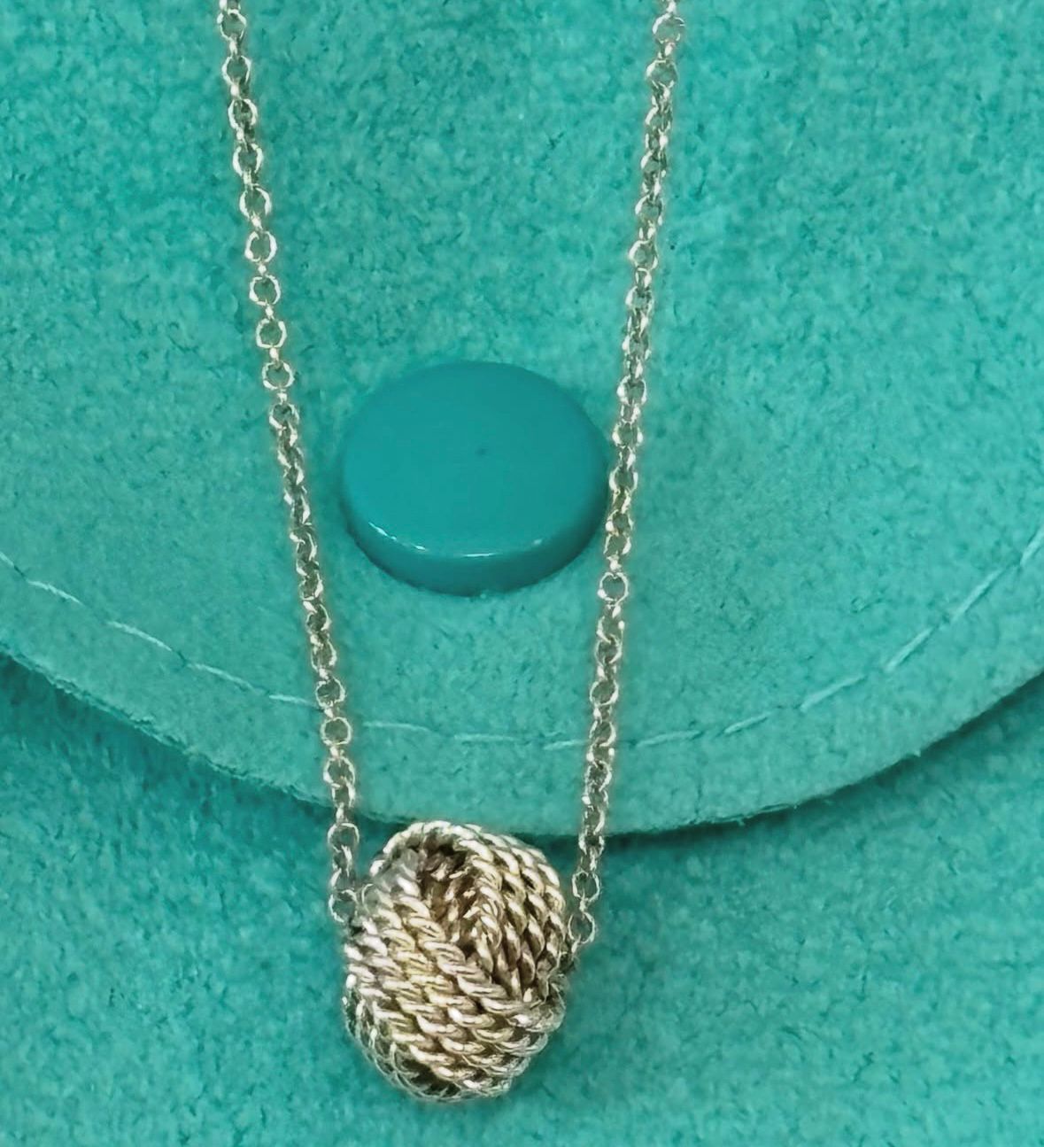 TIFFANY & CO. STERLING SILVER KNOT PENDANT