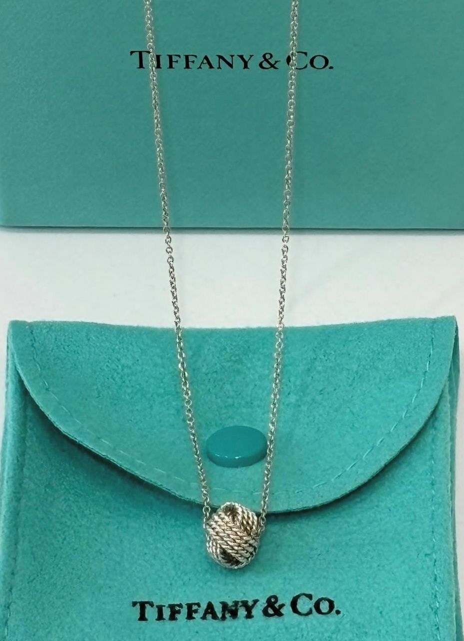 TIFFANY & CO. STERLING SILVER KNOT PENDANT