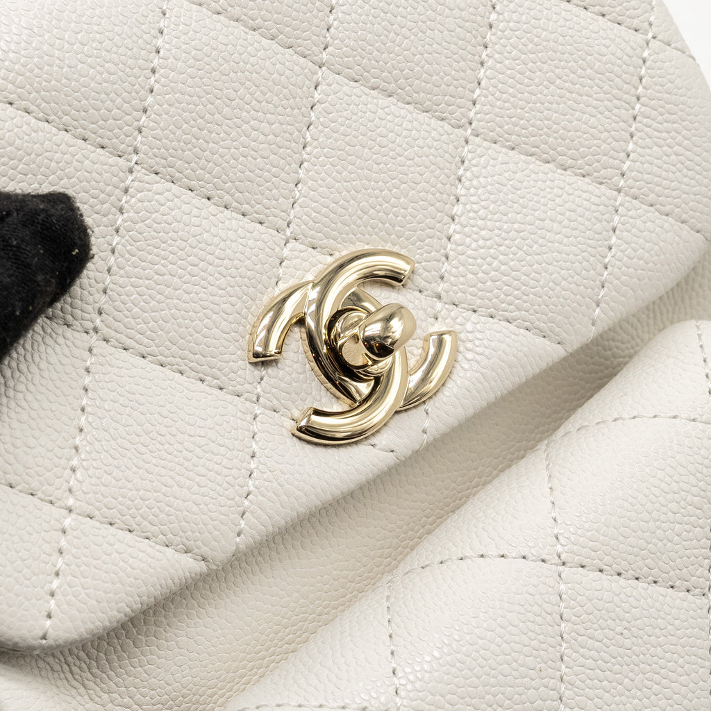 Chanel 23K Triple Pocket Mini Backpack Caviar White L (Microchip)