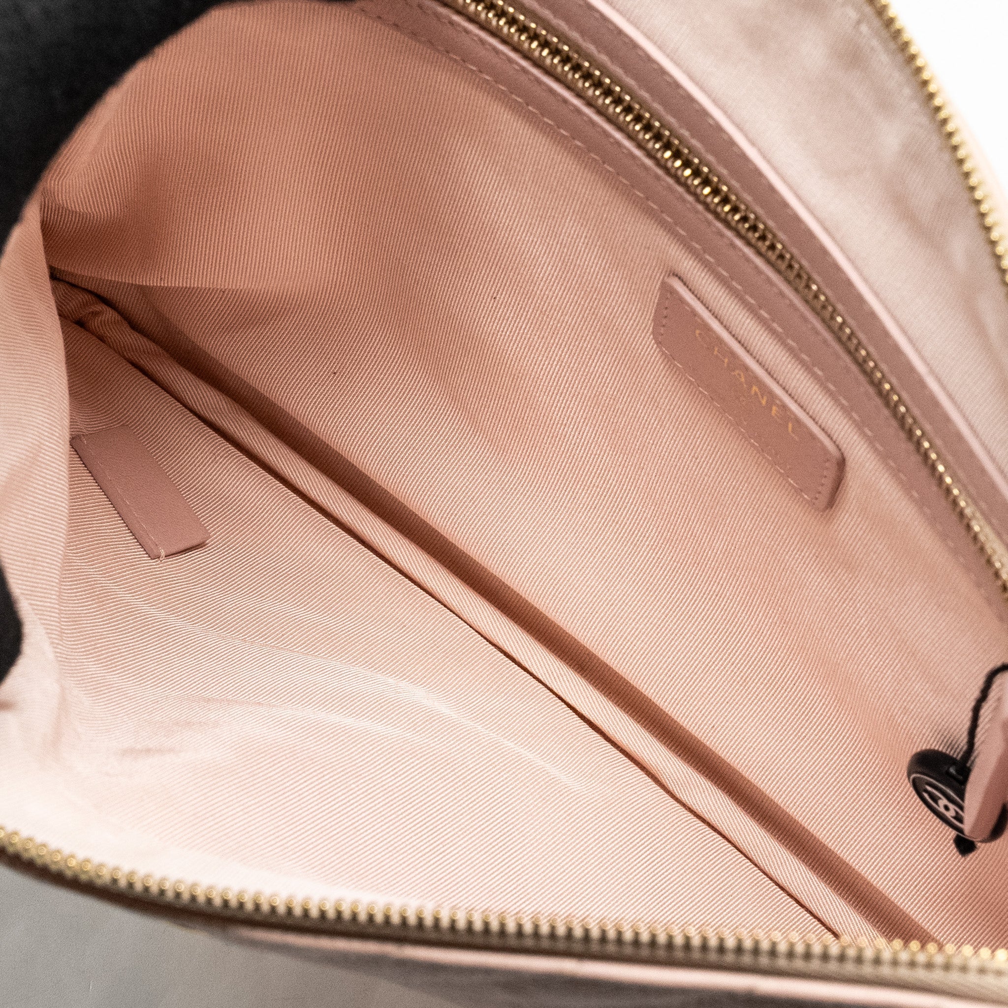 Chanel Chevron Zip Clutch calfskin light pink