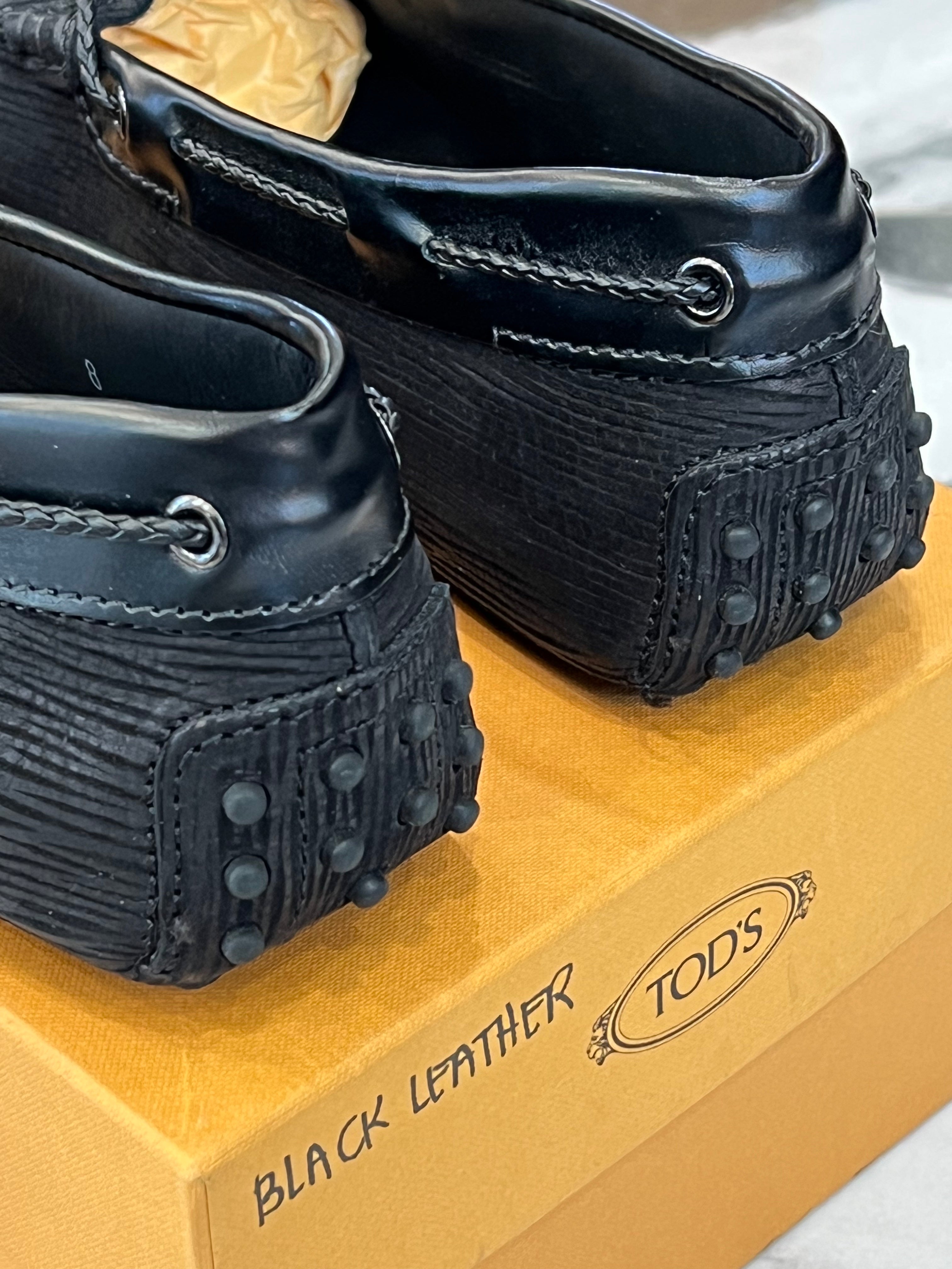 TOD'S LACCETTO DRIVING LOAFERS WITH BRAIDED KNOT FRONT