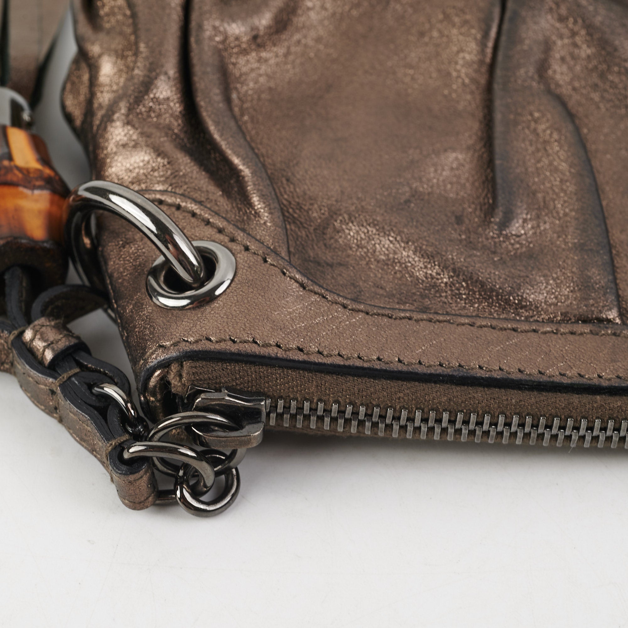 Gucci Metallic Bronze Tassel Pouch