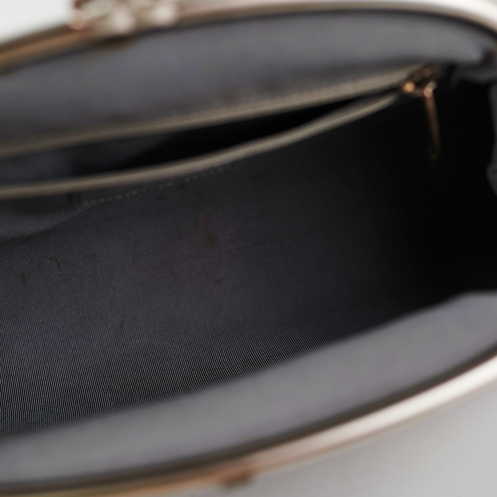 ITEM 27 - Chanel Metallic Grey Clutch