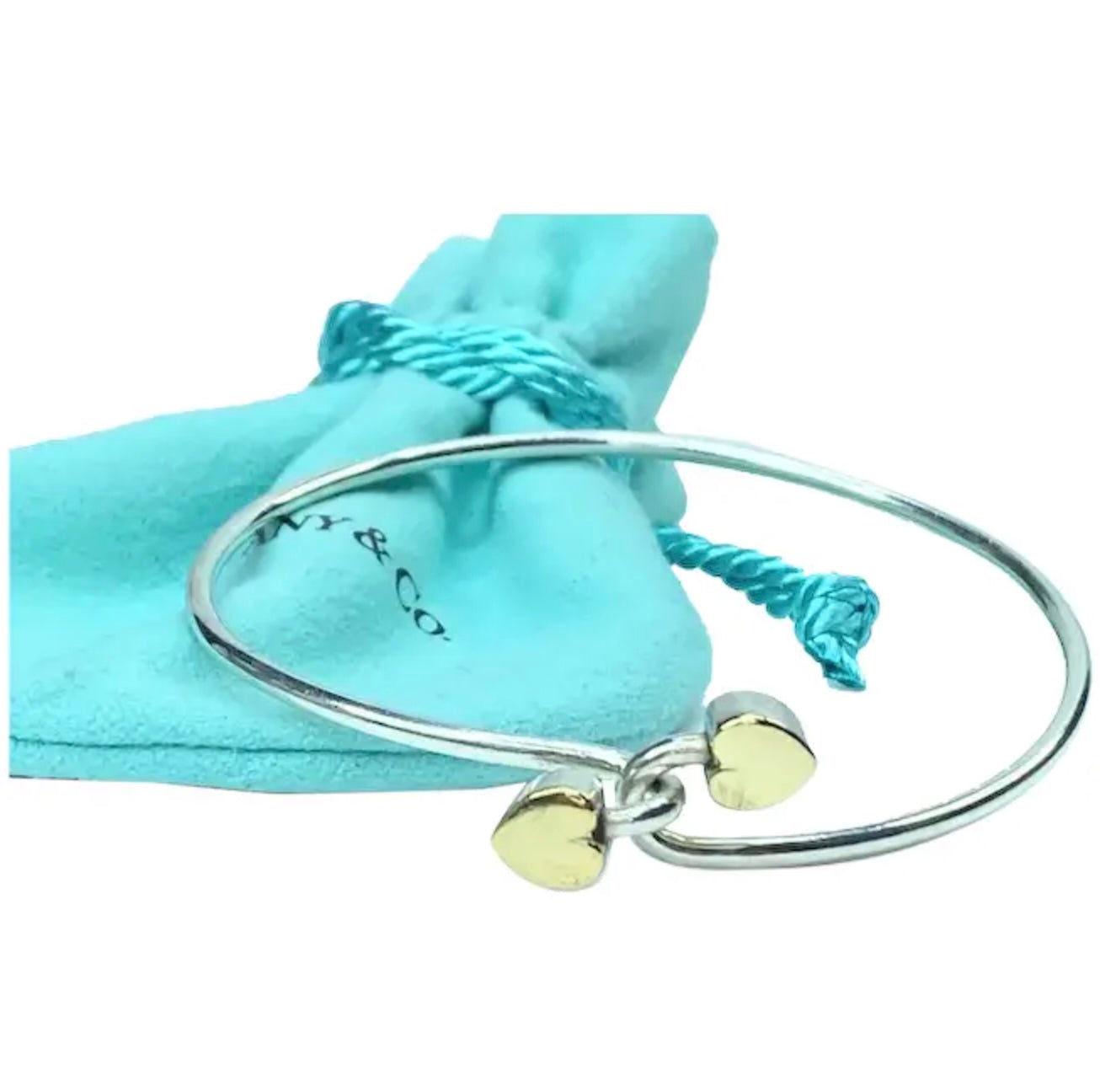 TIFFANY & CO. 18K GOLD AND STERLING SILVER HEART BANGLE BRACELET