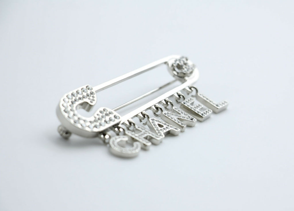Chanel B18P Rhinestone Metal Thick ‘CHANEL’ Brooch