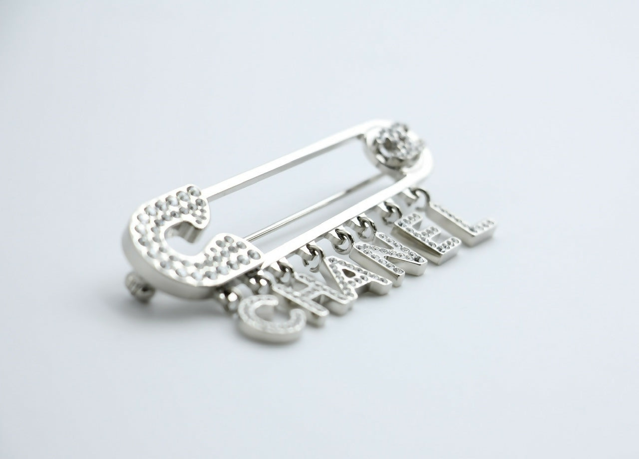 Chanel B18P Rhinestone Metal Thick ‘CHANEL’ Brooch