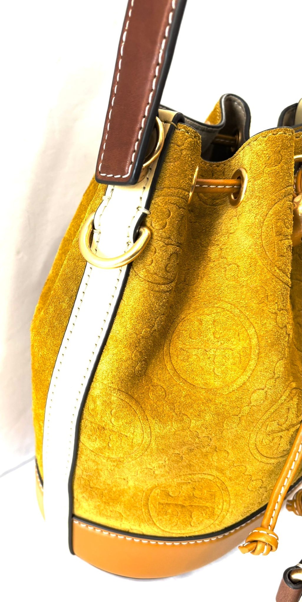 TORY BURCH MONOGRAM EMBOSSED SUEDE BUCKET BAG