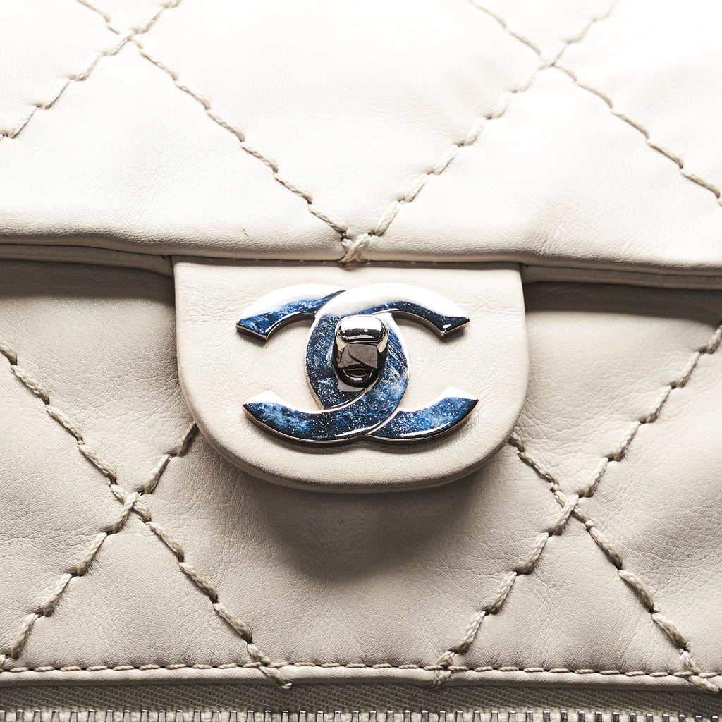 Chanel Quilted Expandable Ligne Flap Bag