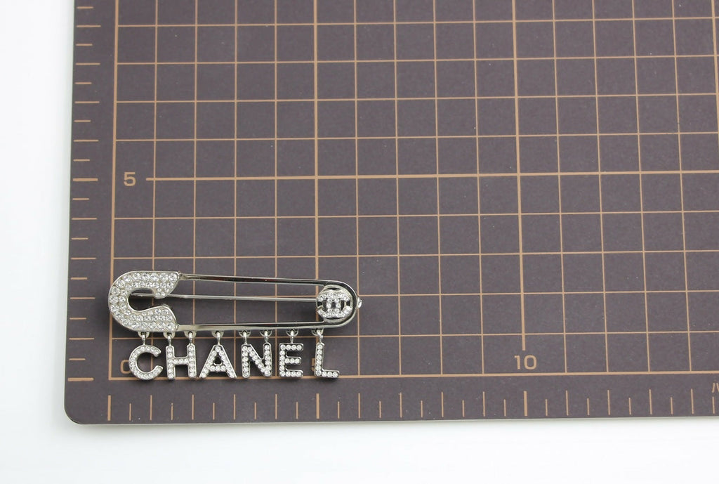 Chanel B18P Rhinestone Metal Thick ‘CHANEL’ Brooch