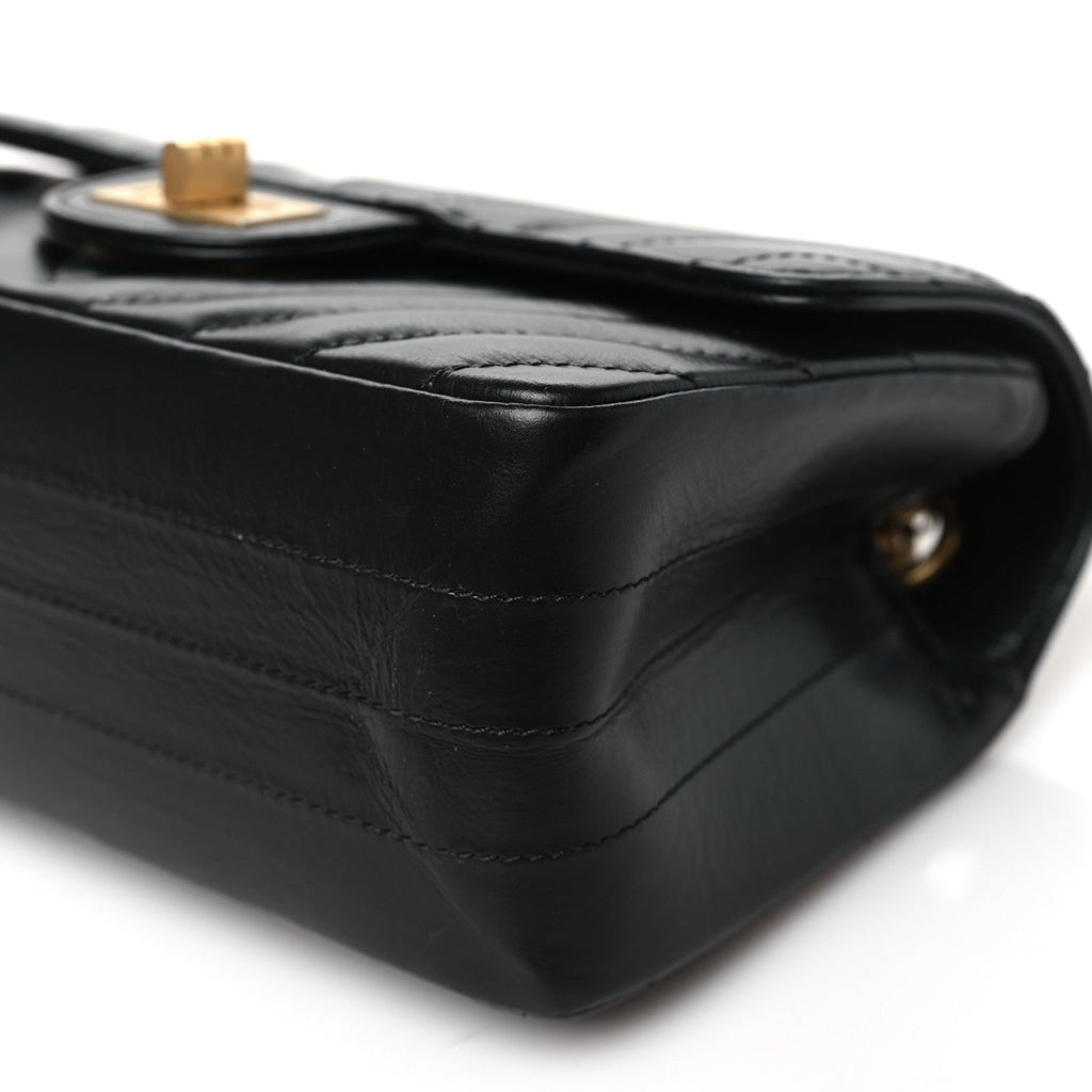 Aged Calfskin Chevron Quilted 2.55 Reissue Mini Flap Black
