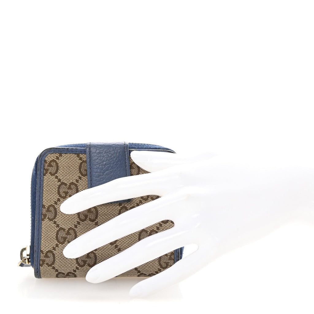 Monogram Dollar Calfskin Zip Around French Flap Wallet Beige Ebony Caspian
