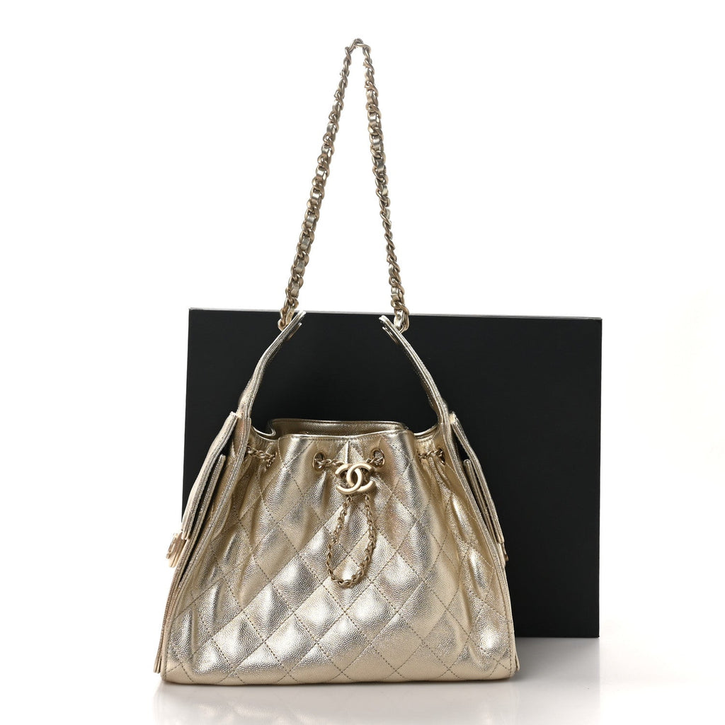 Metallic Caviar Quilted Small Chanel 25 Handbag Gold