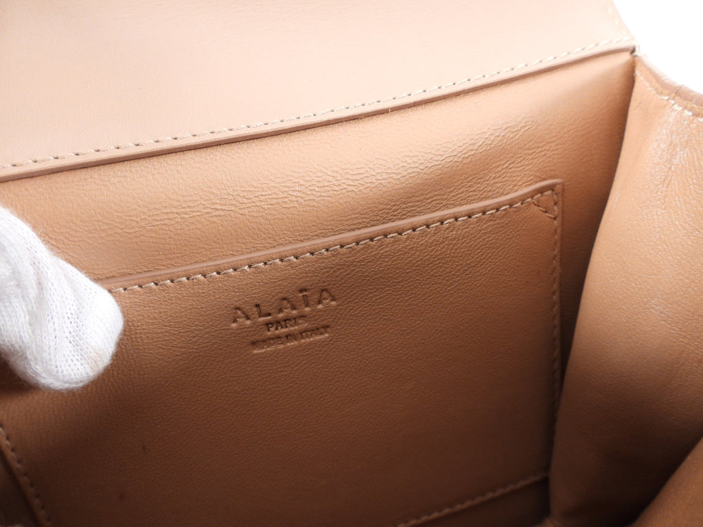 Alaia Small Stud Nude Leather Crossbody Bag