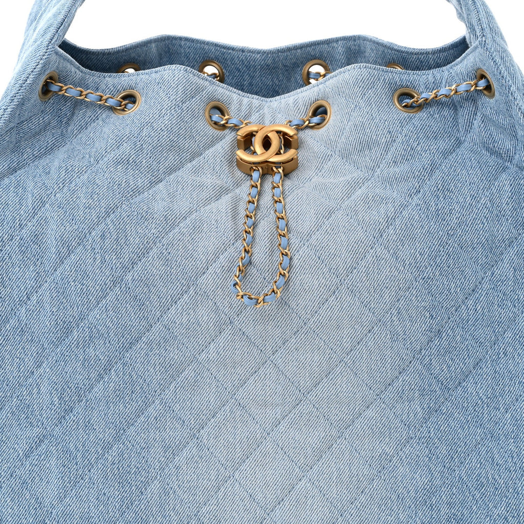 Washed Denim Quilted Medium Chanel 25 Handbag Blue