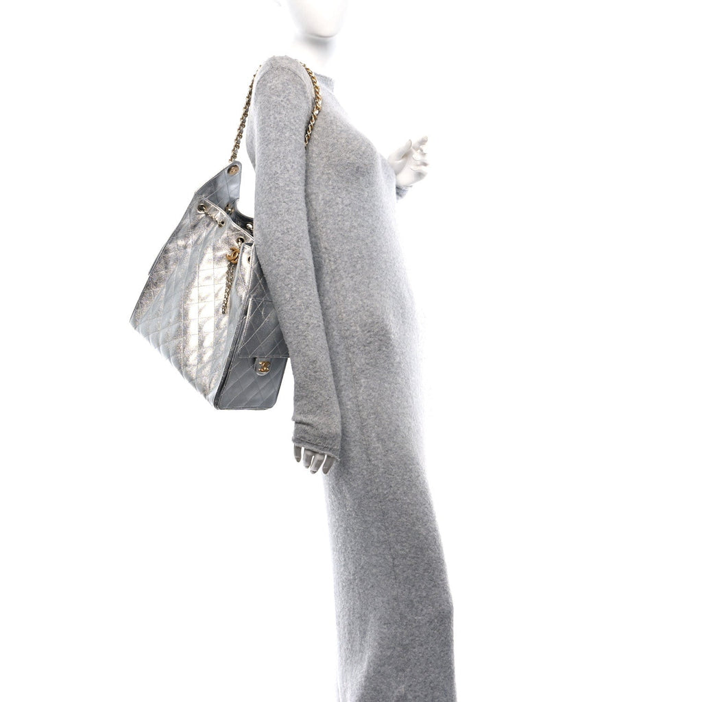Metallic Caviar Quilted Medium Chanel 25 Handbag Silver