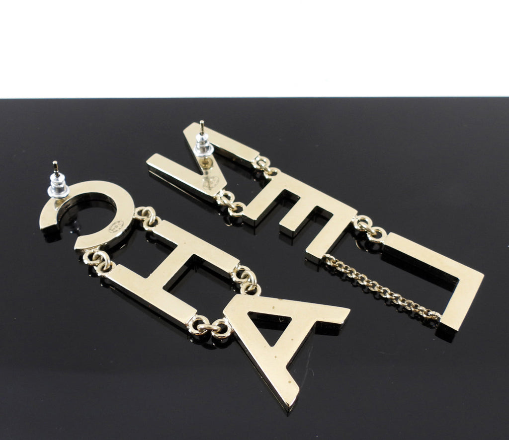 Chanel 19S Light Goldtone Spellout Logo Drop Earrings