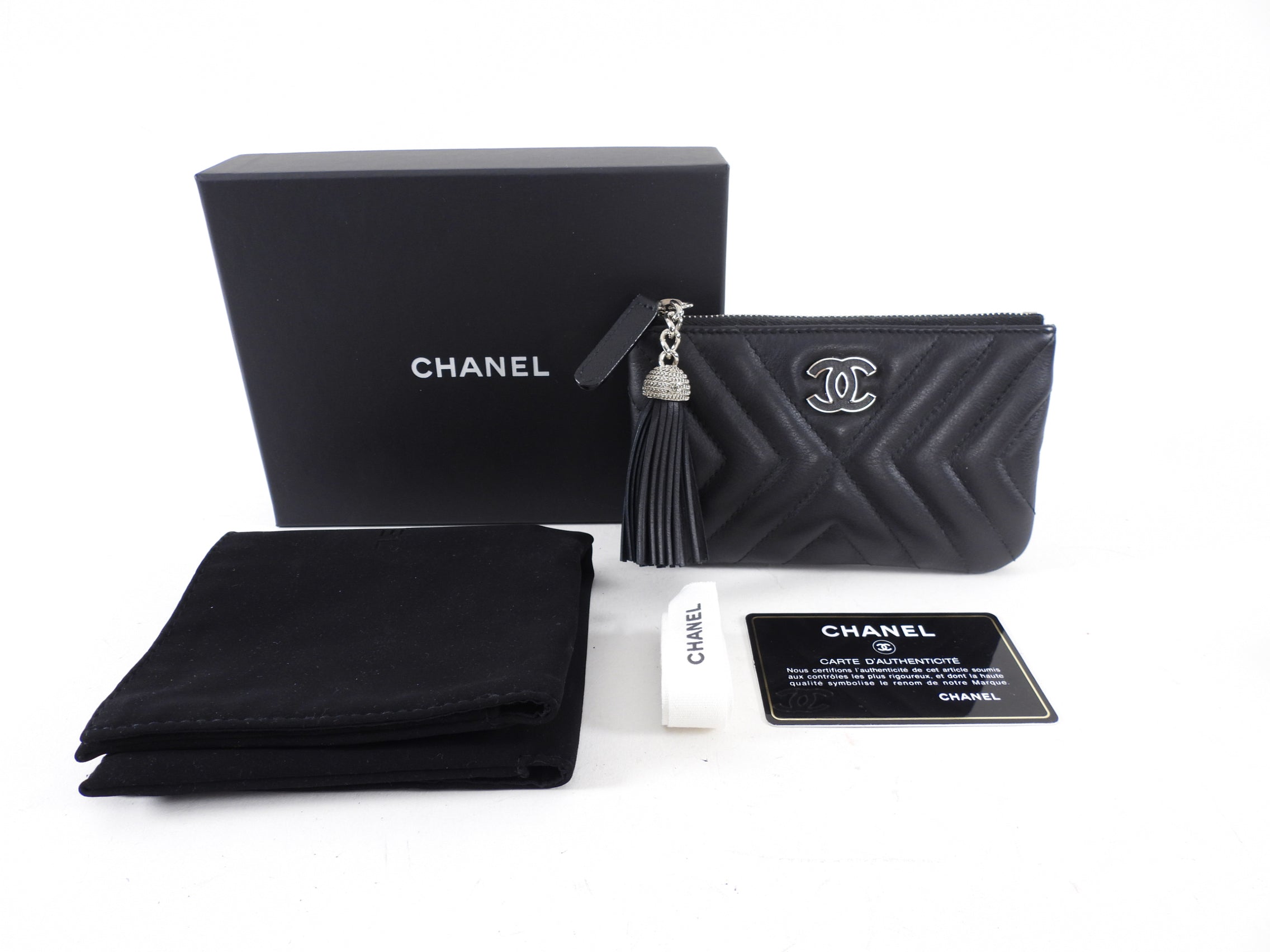 Chanel Black Leather Chevron Tassel Mini Zip Pouch