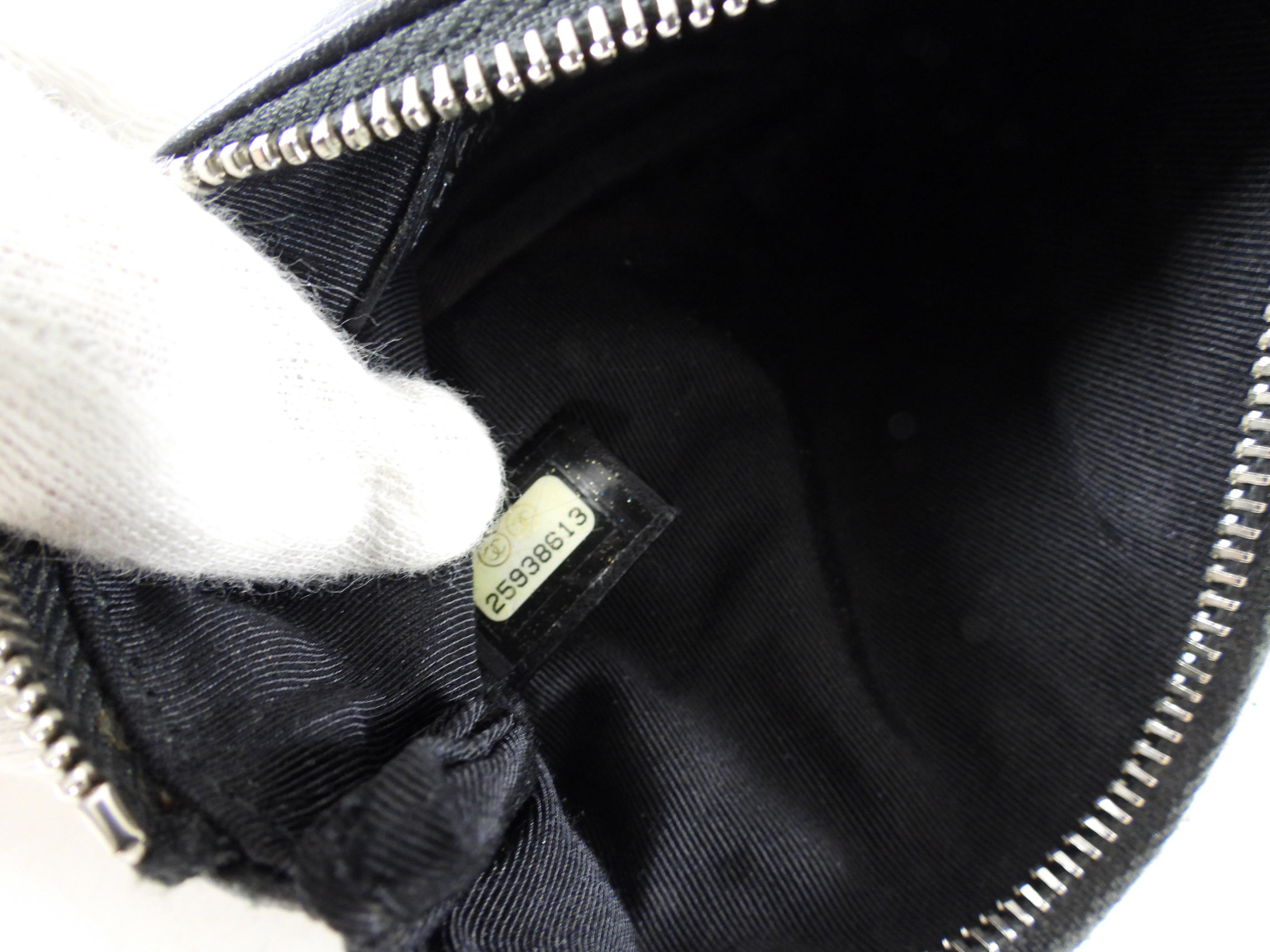 Chanel Black Leather Chevron Tassel Mini Zip Pouch