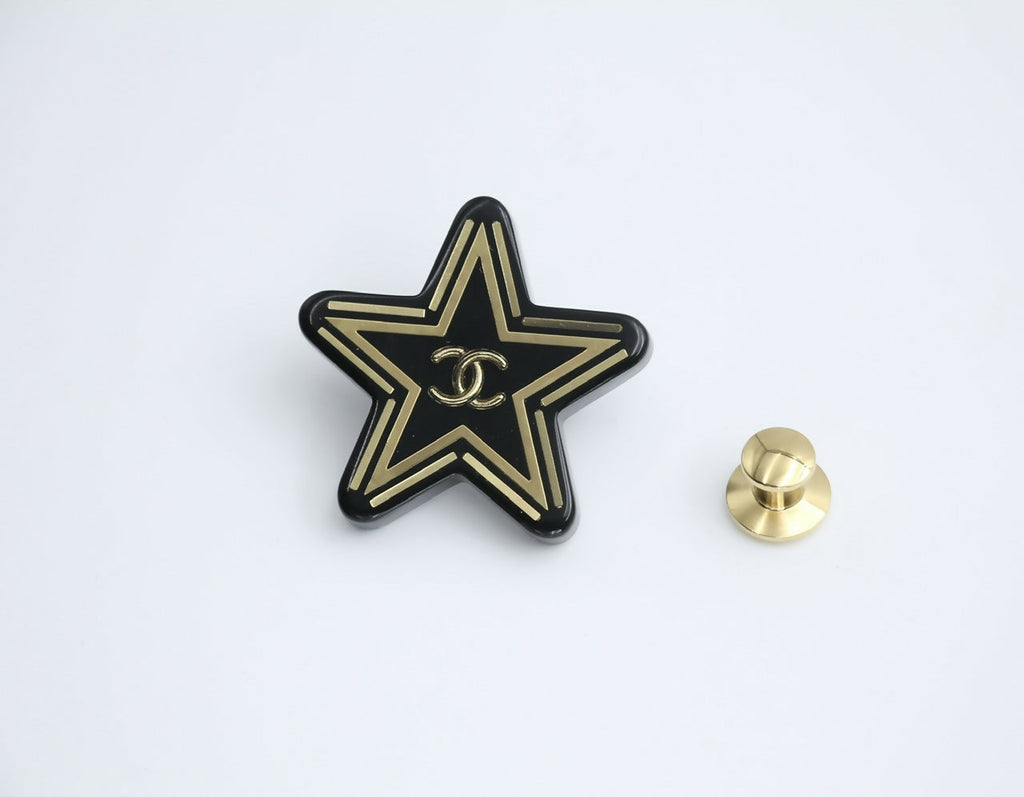 Chanel D21S Resin Black Gold Star Brooch