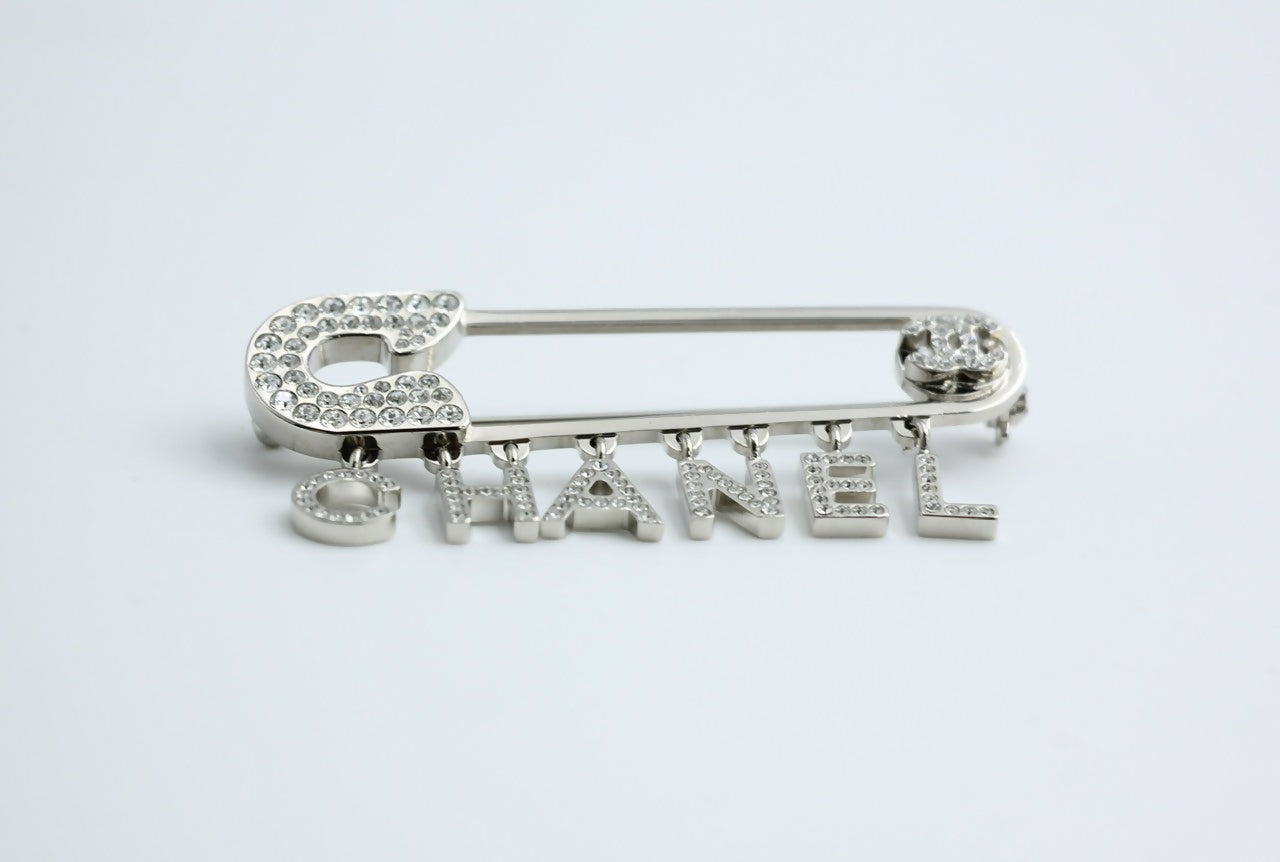 Chanel B18P Rhinestone Metal Thick ‘CHANEL’ Brooch