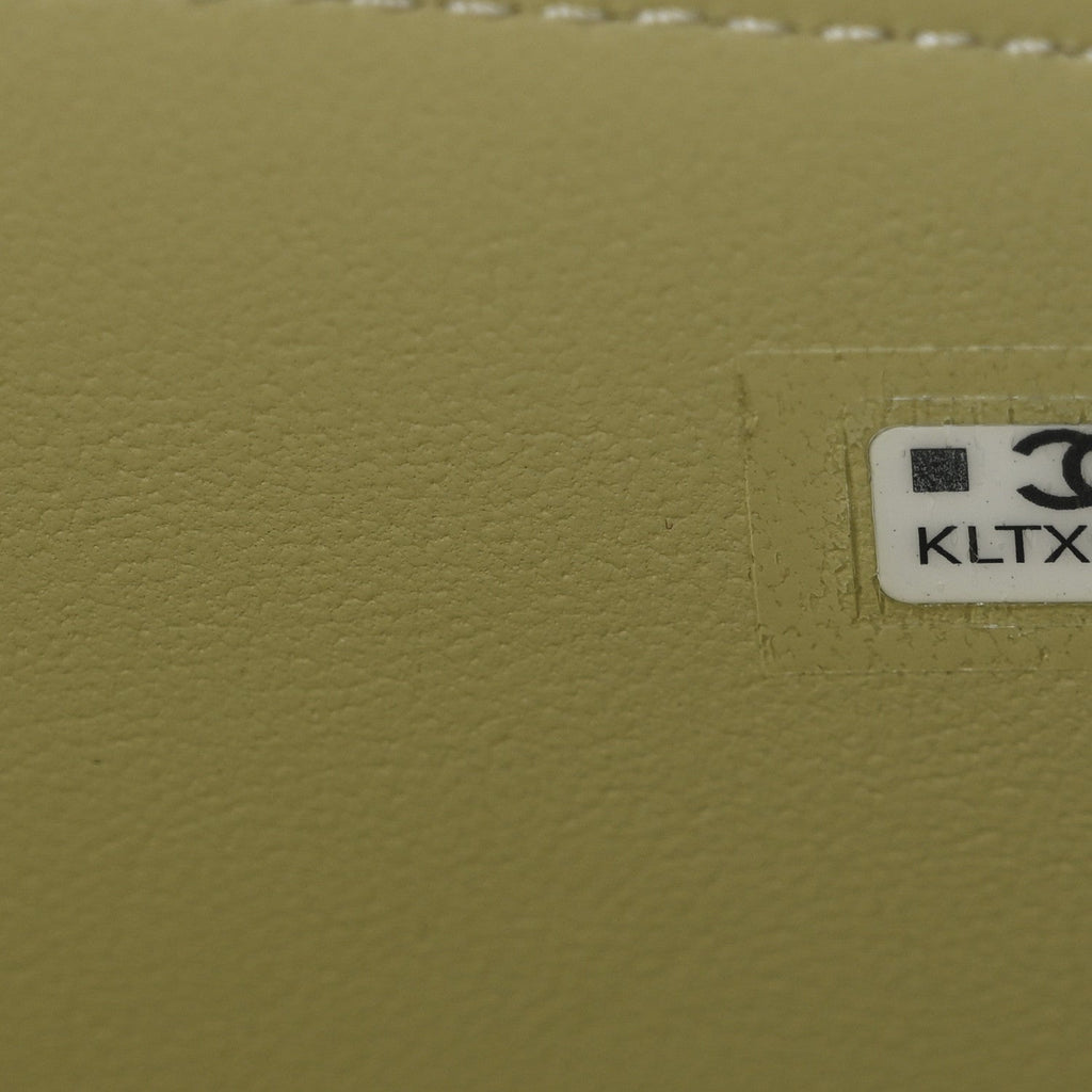 Lambskin Quilted Small Top Handle Vanity Case With Chain Light Green
