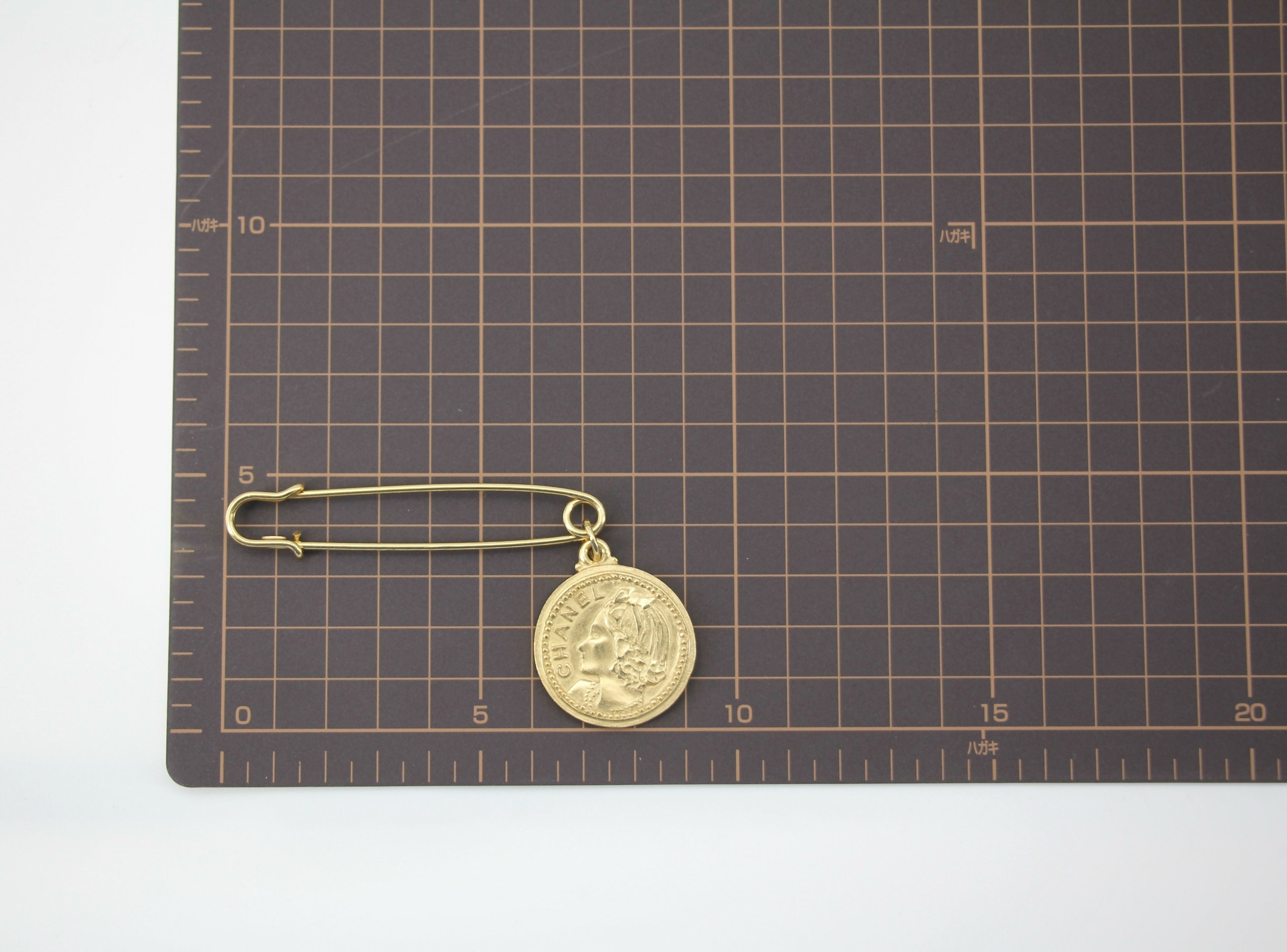 Chanel Vintage 03P Metal Ms Coco Coin Motif Brooch