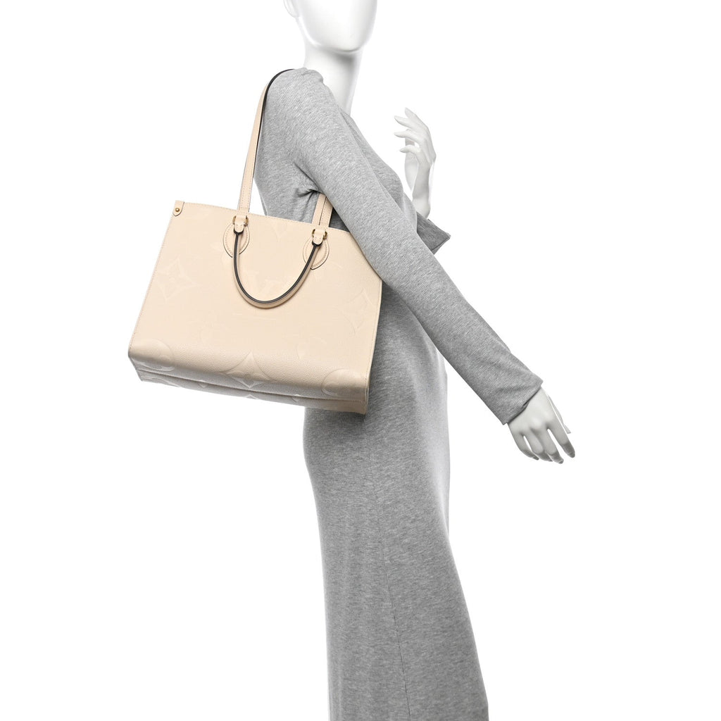 Empreinte Monogram Giant Onthego MM Creme