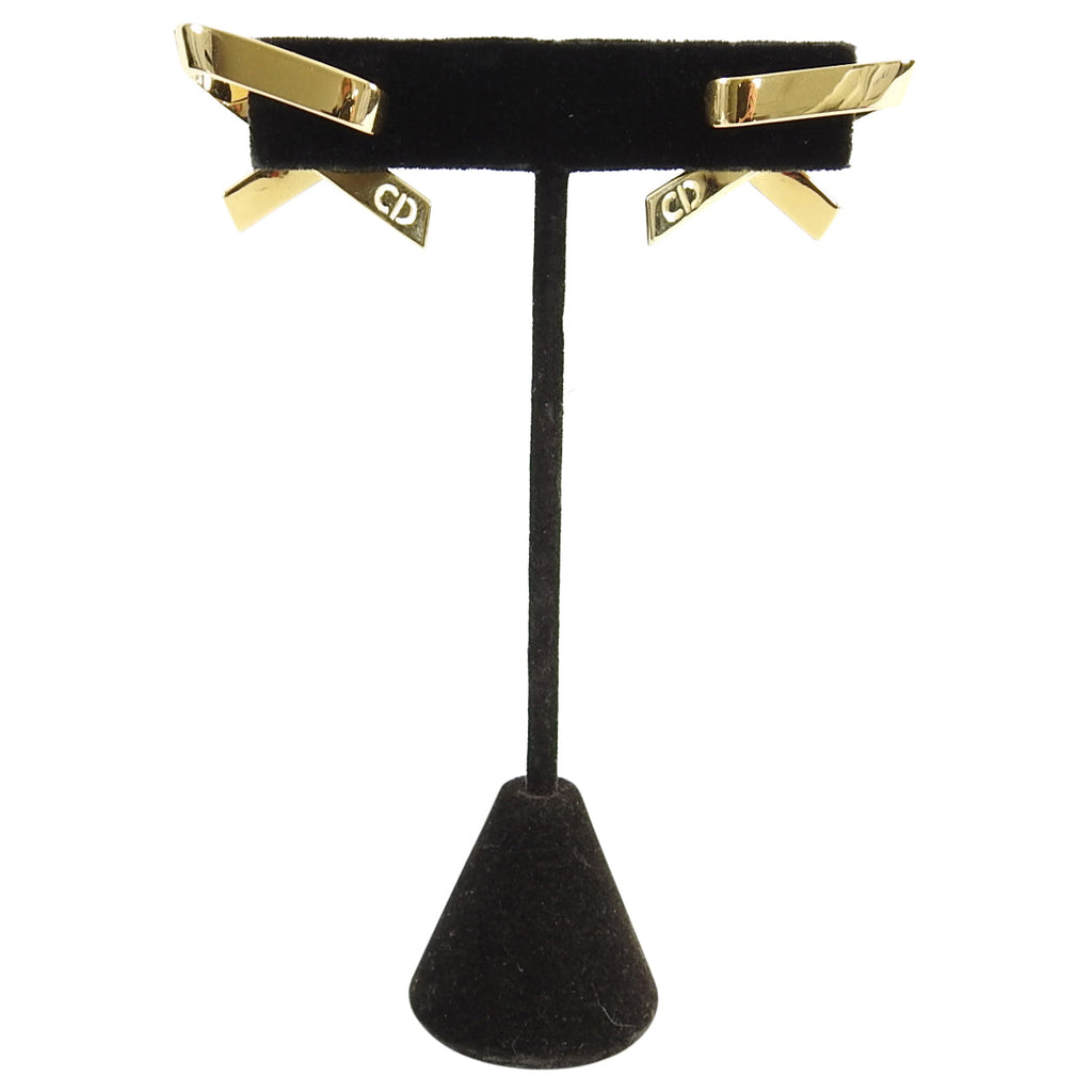 Dior Gold Wave Ribbon Rhianna Earrings