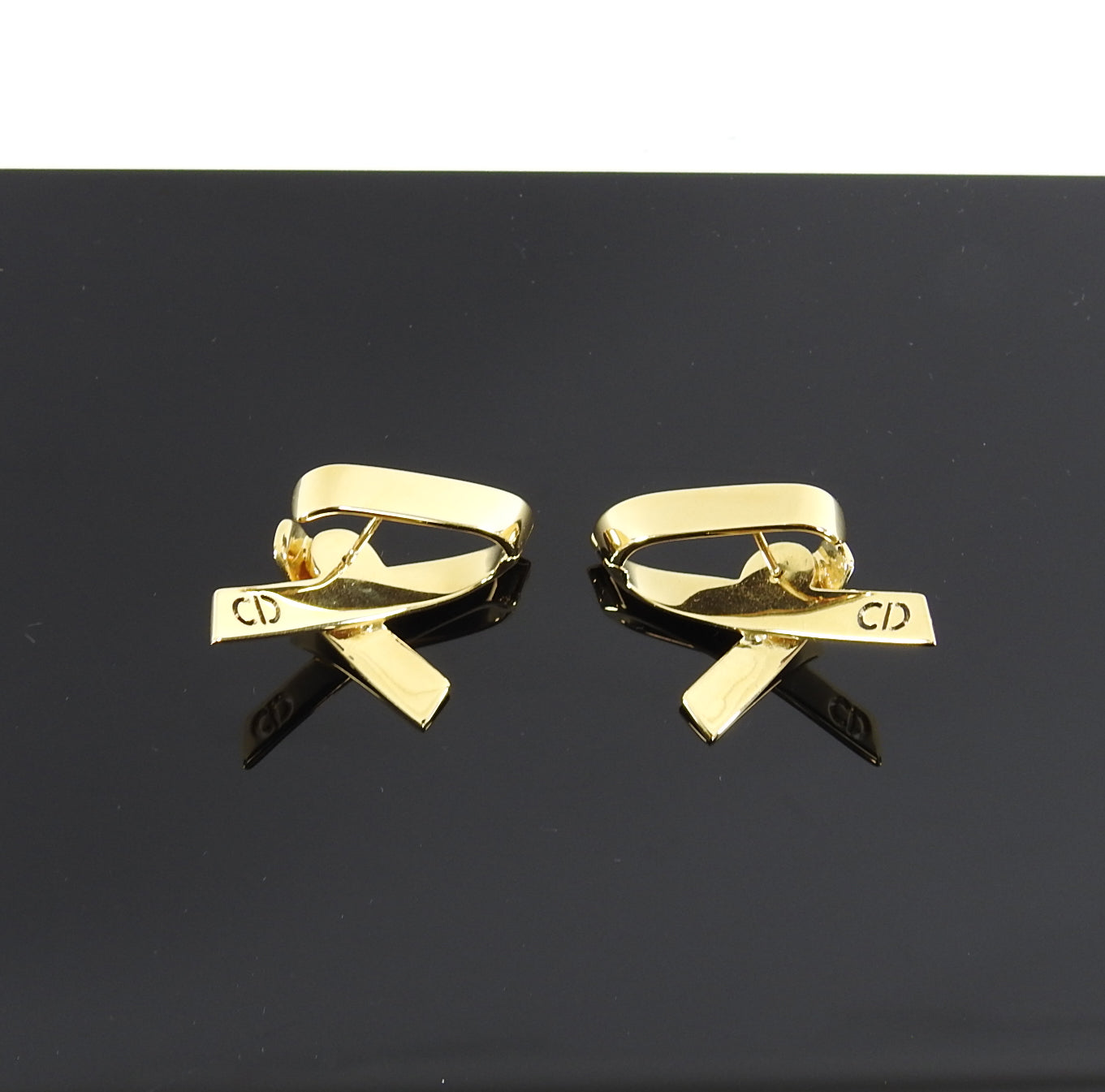 Dior Gold Wave Ribbon Rhianna Earrings