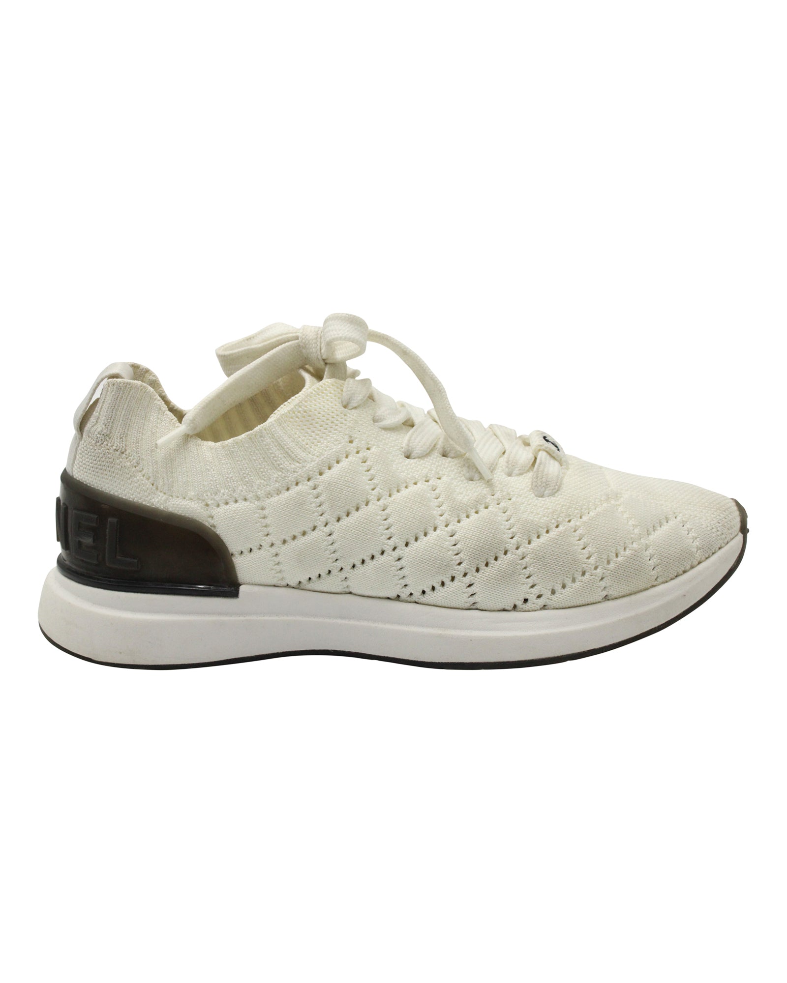 Women's Chanel Quilted Low-Top Sneakers in White Wool