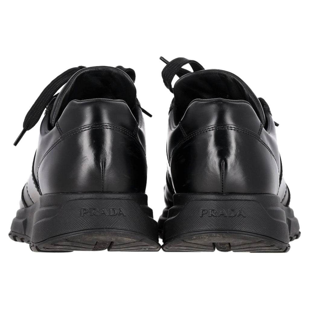 Prada Prax 01 Lace-Up Low-Top Sneakers in Black Calfskin Leather