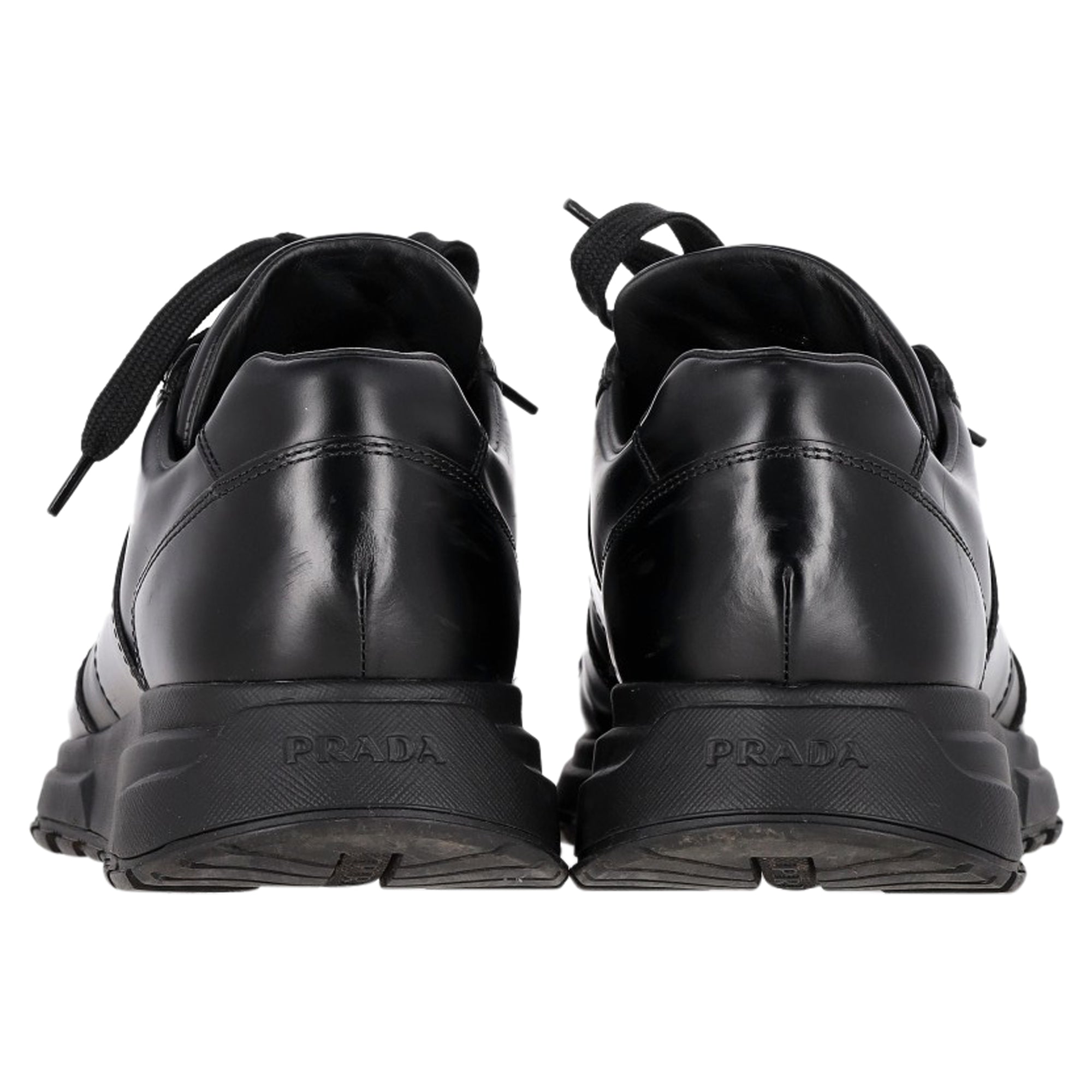 Prada Prax 01 Lace-Up Low-Top Sneakers in Black Calfskin Leather