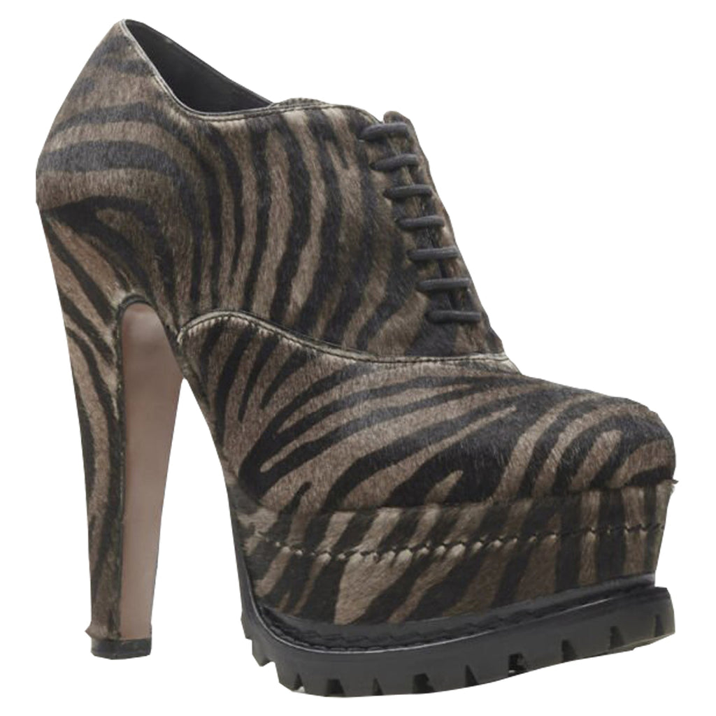 Women's Alaia zebra stripe fur leather truck sole ankle bootie