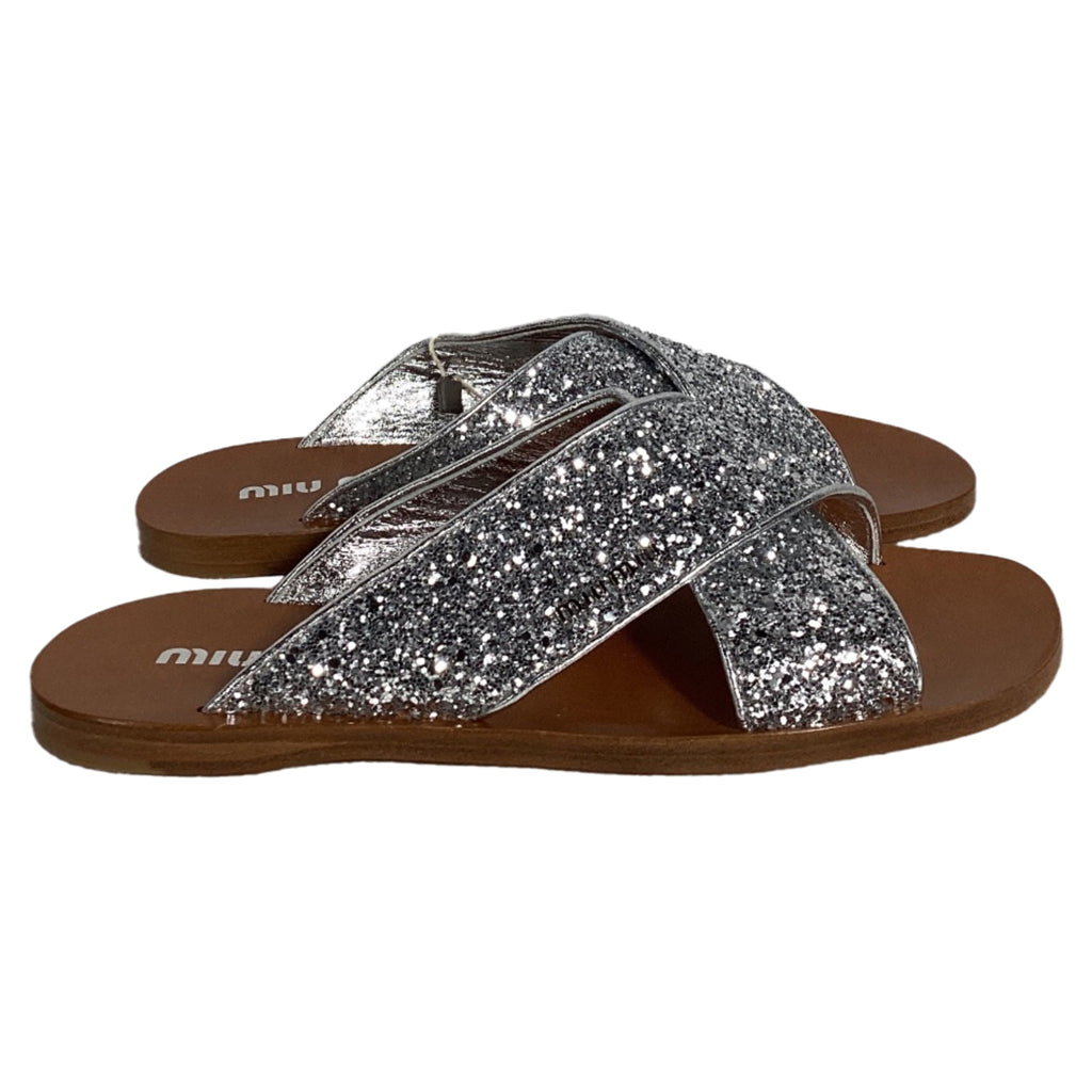 Miu Miu Glittered Slip-on Flat Sandals in Silver Leather