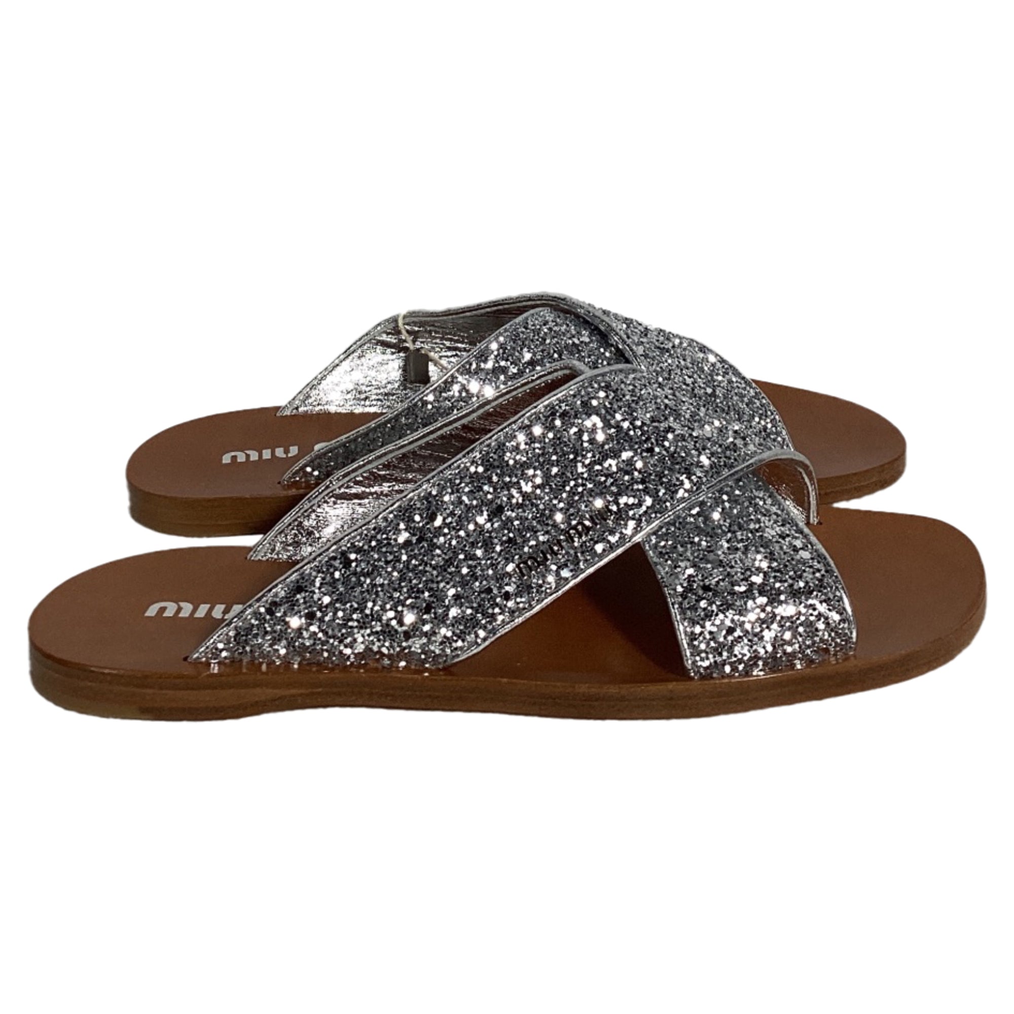 Miu Miu Glittered Slip-on Flat Sandals in Silver Leather