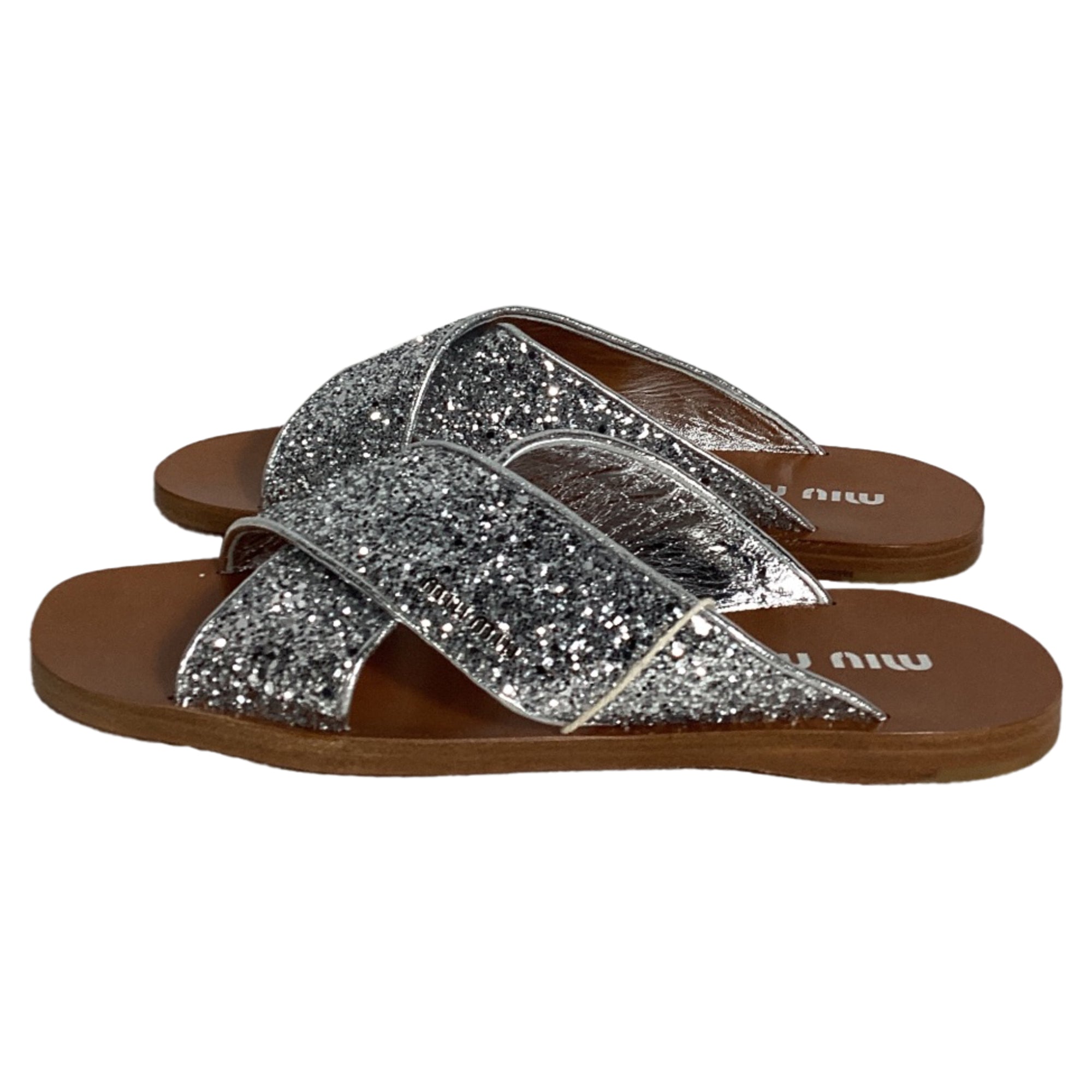 Miu Miu Glittered Slip-on Flat Sandals in Silver Leather