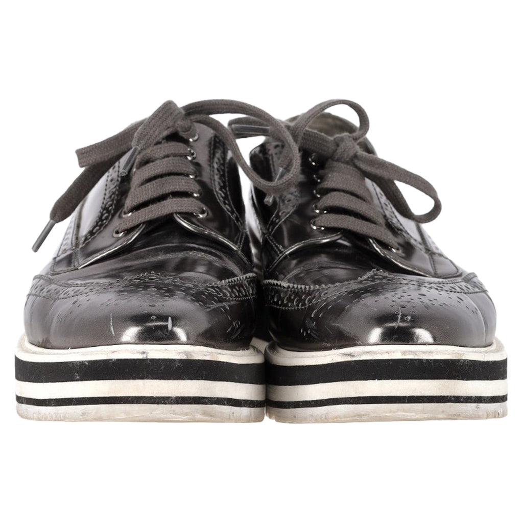 Prada Metallic Brogue Platform Low Top Sneakers in Silver Leather