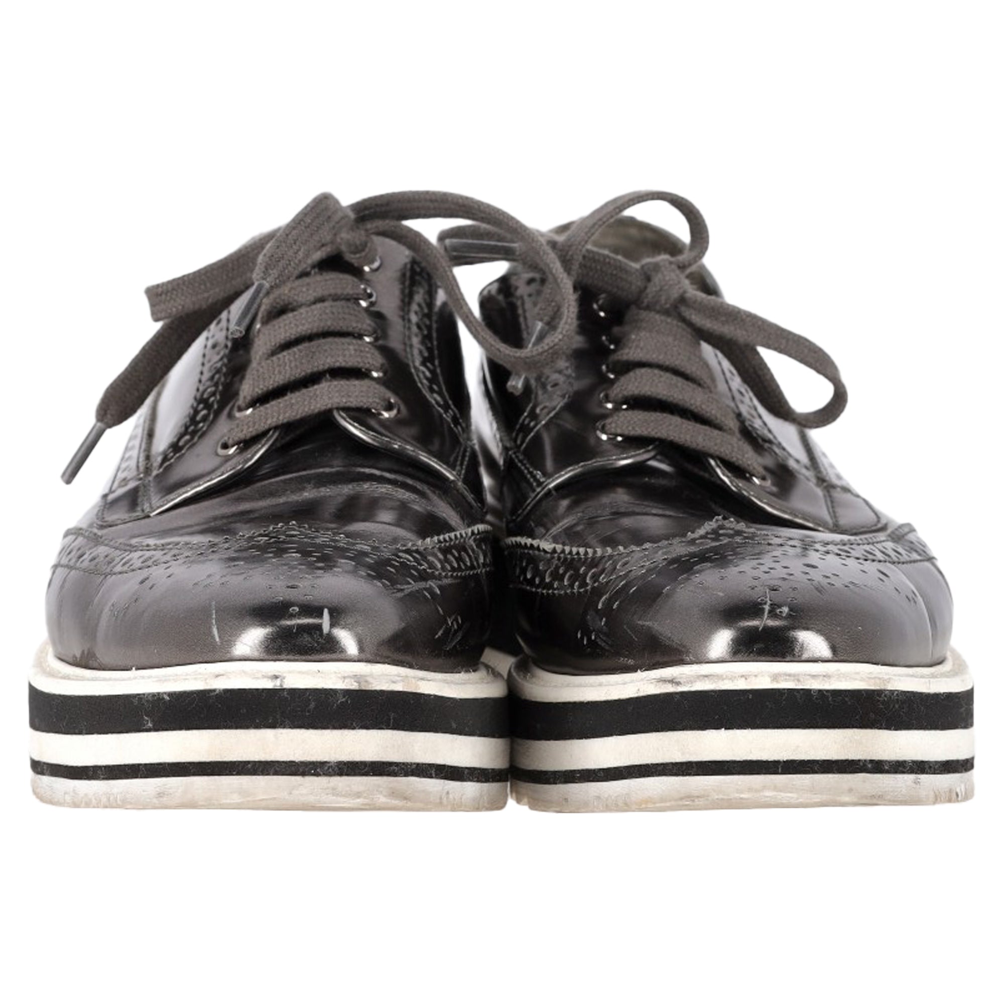 Prada Metallic Brogue Platform Low Top Sneakers in Silver Leather