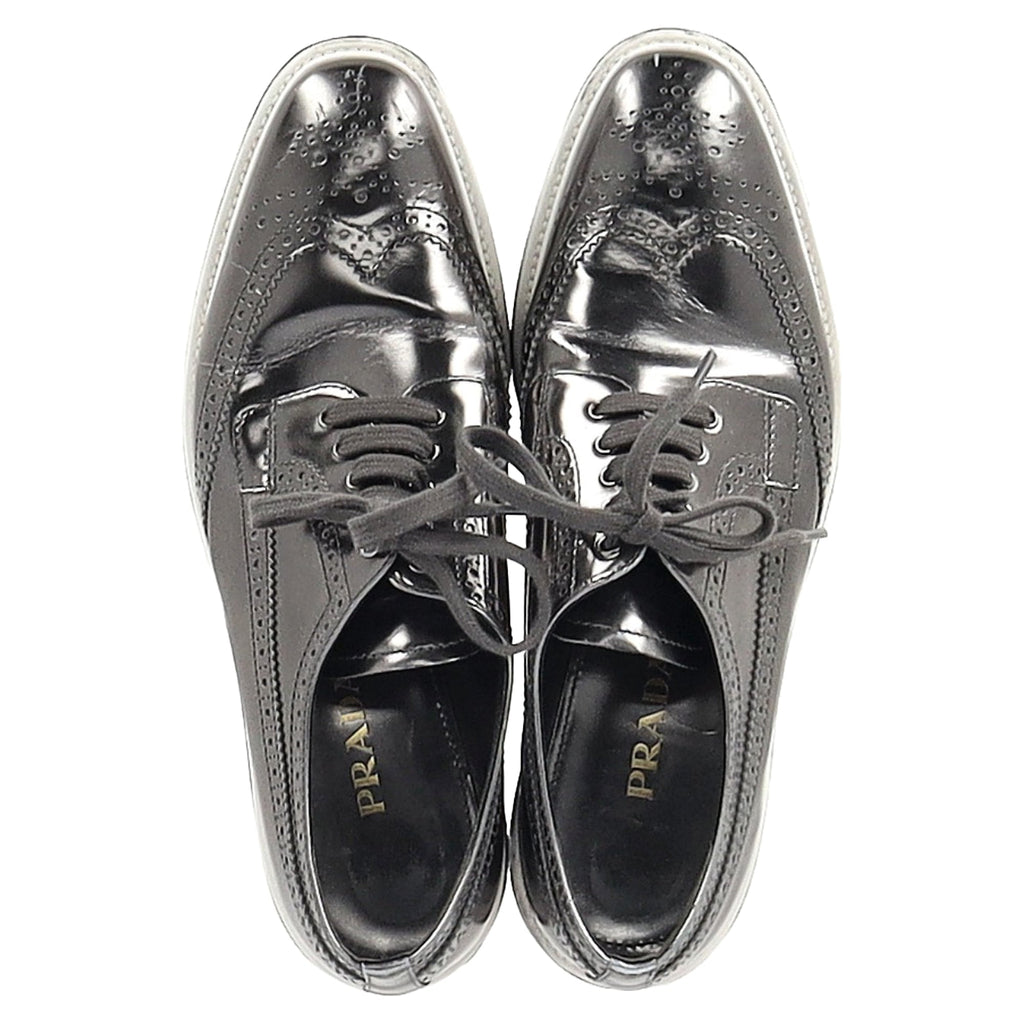 Prada Metallic Brogue Platform Low Top Sneakers in Silver Leather