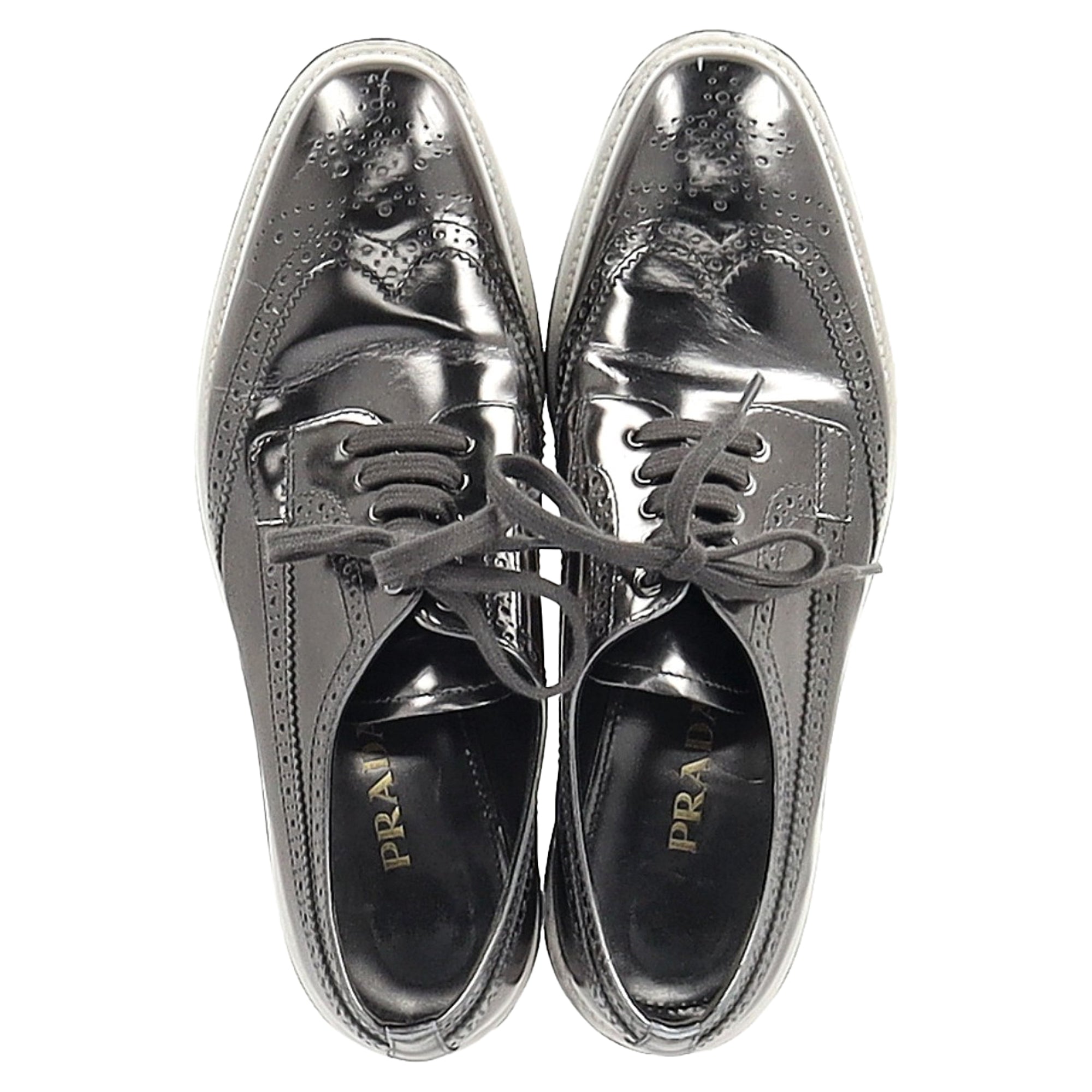 Prada Metallic Brogue Platform Low Top Sneakers in Silver Leather