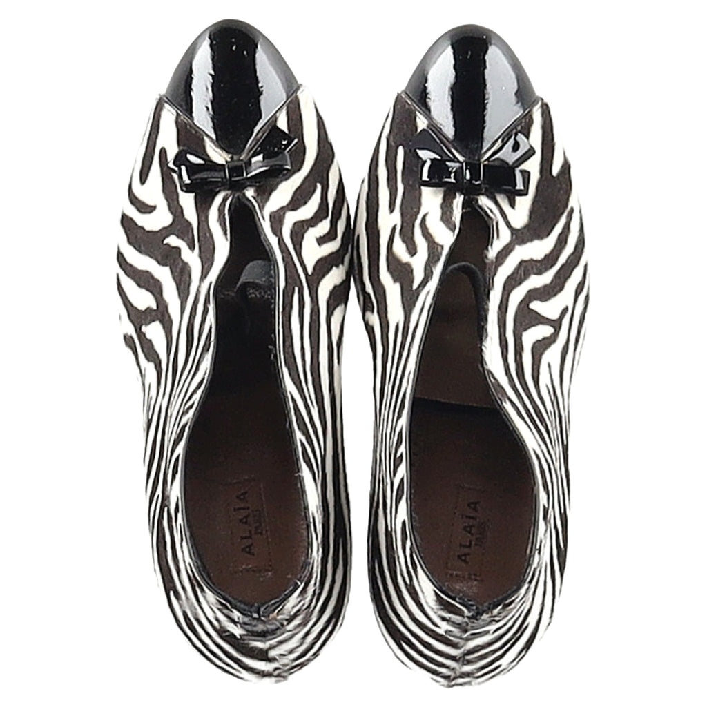 Women's Alaia Azzedine Zebra Print Booties in Black and White Calfskin Pony Hair