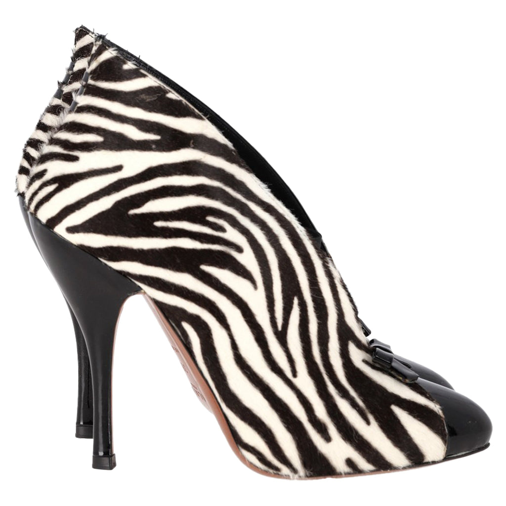 Women's Alaia Azzedine Zebra Print Booties in Black and White Calfskin Pony Hair