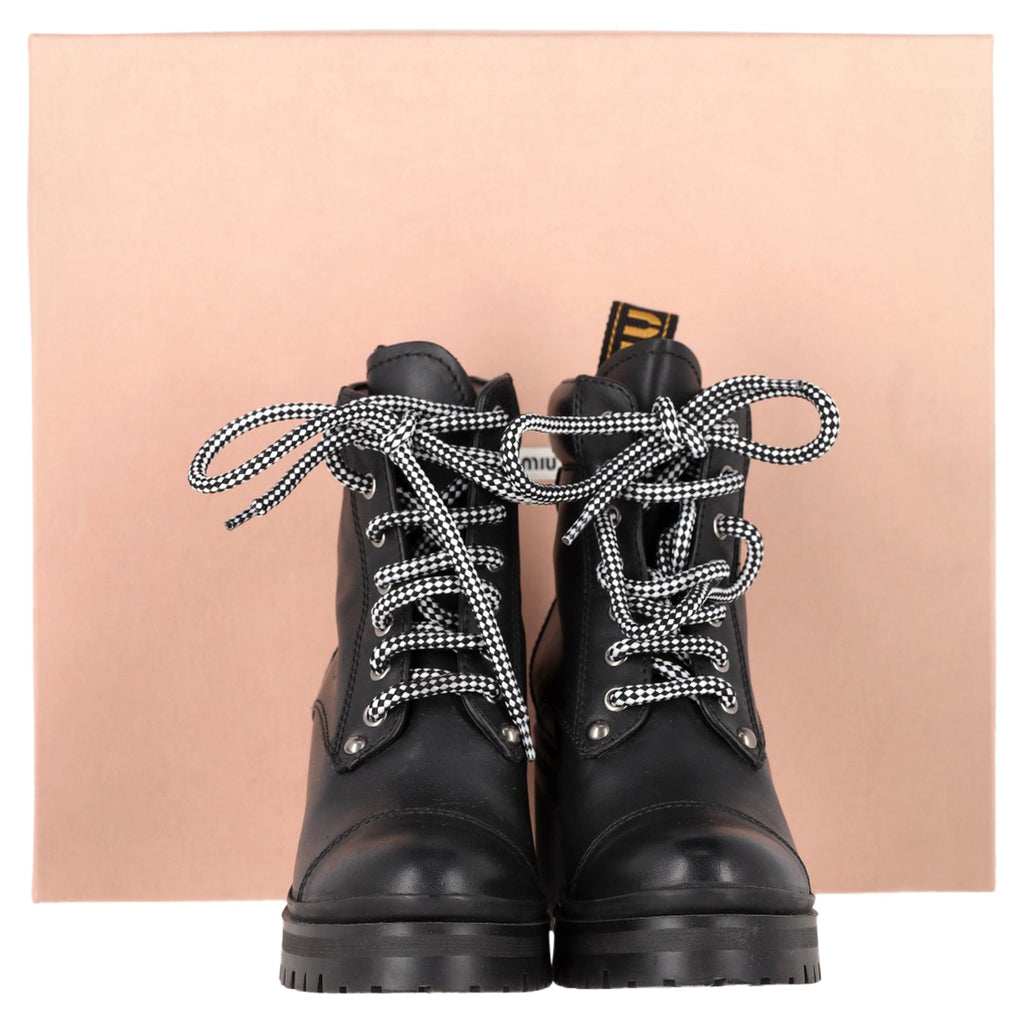 Miu Miu Lugged Sole Combat Boots in Black Leather